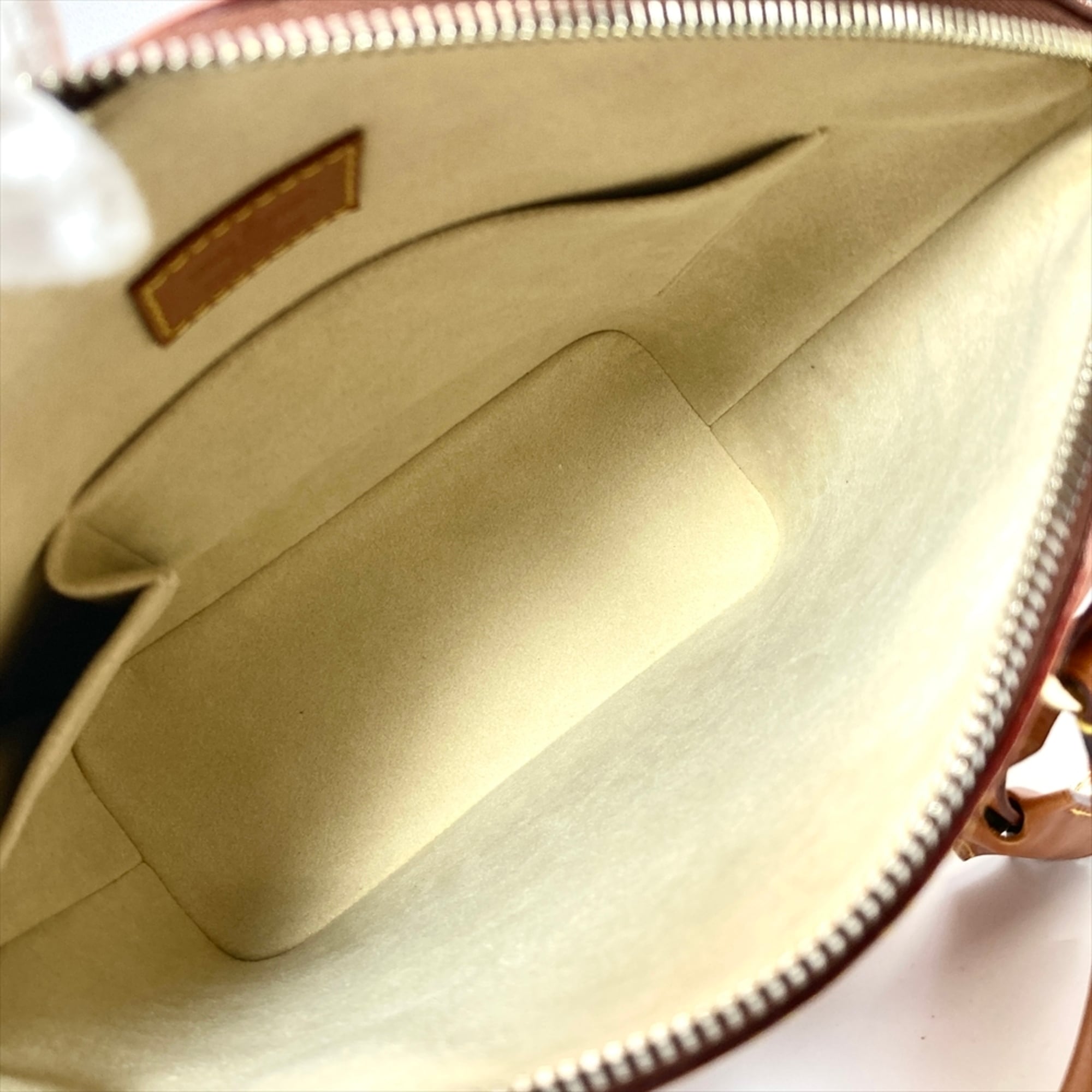 Louis Vuitton Camel Nomade Leather Handbag (Pre-Owned)
