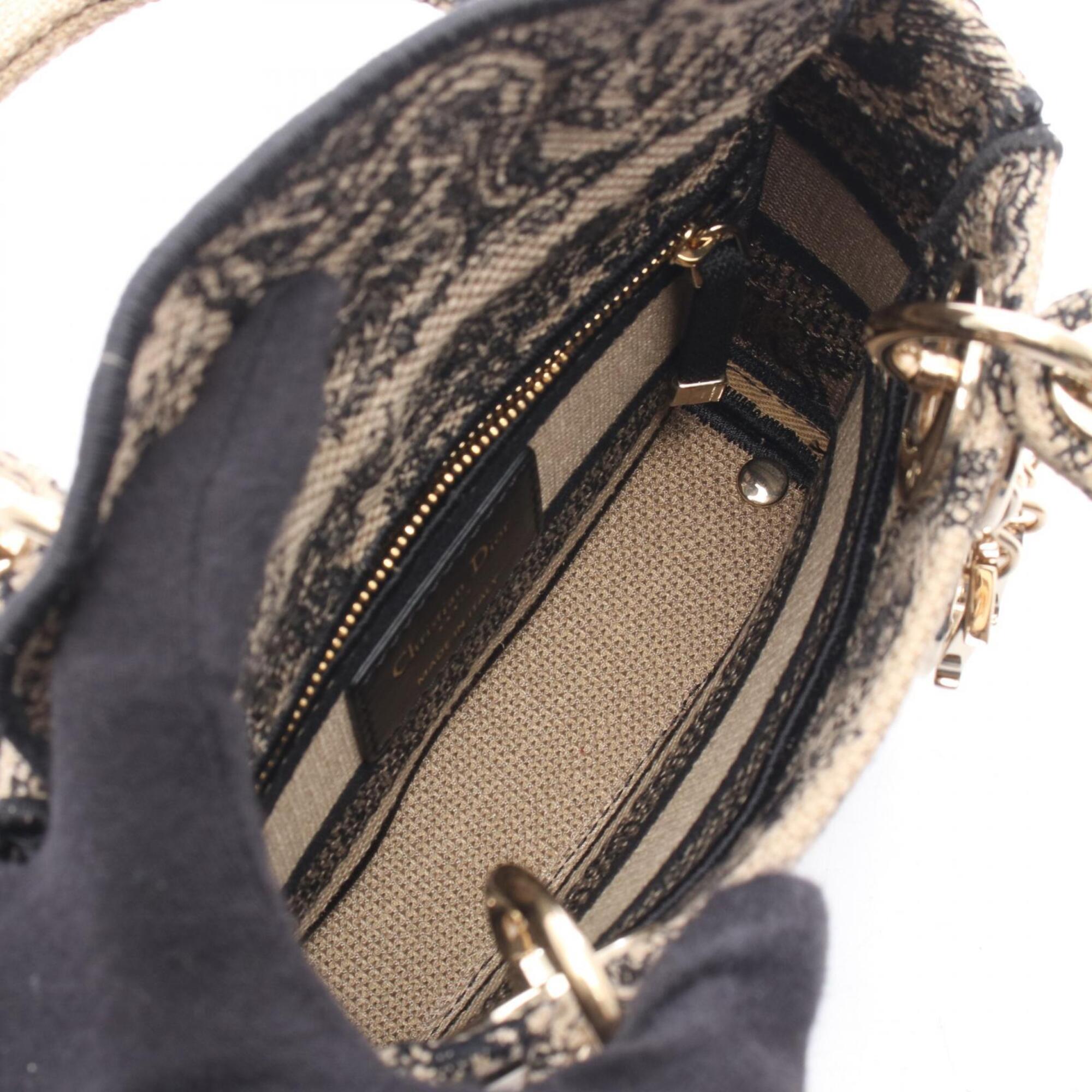 Christian Dior Beige Black Canvas Handbag (Pre-Owned)
