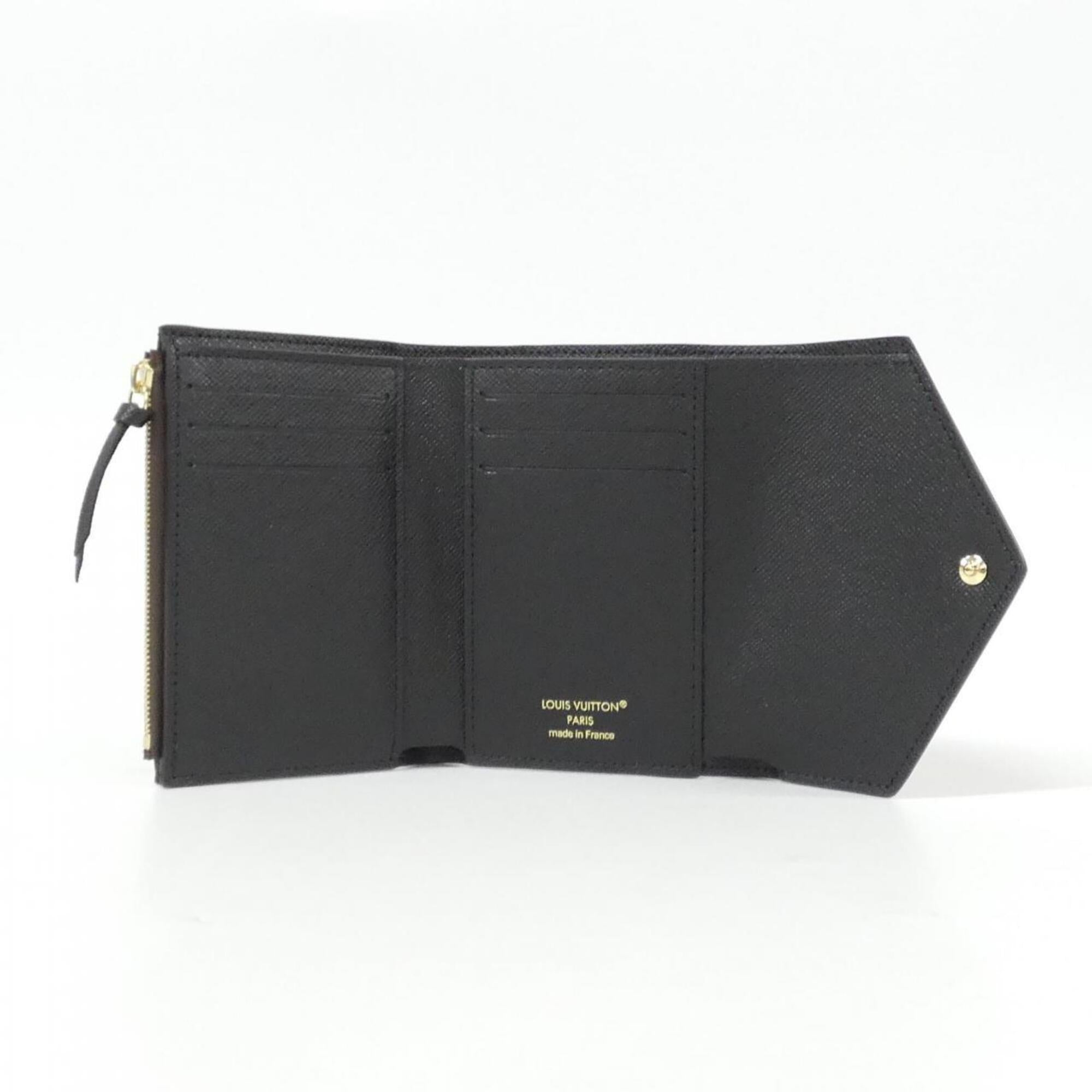 Louis Vuitton Monogram Reverse Marron Coated Canvas Wallet (Bi-Fold) (Pre-Owned)