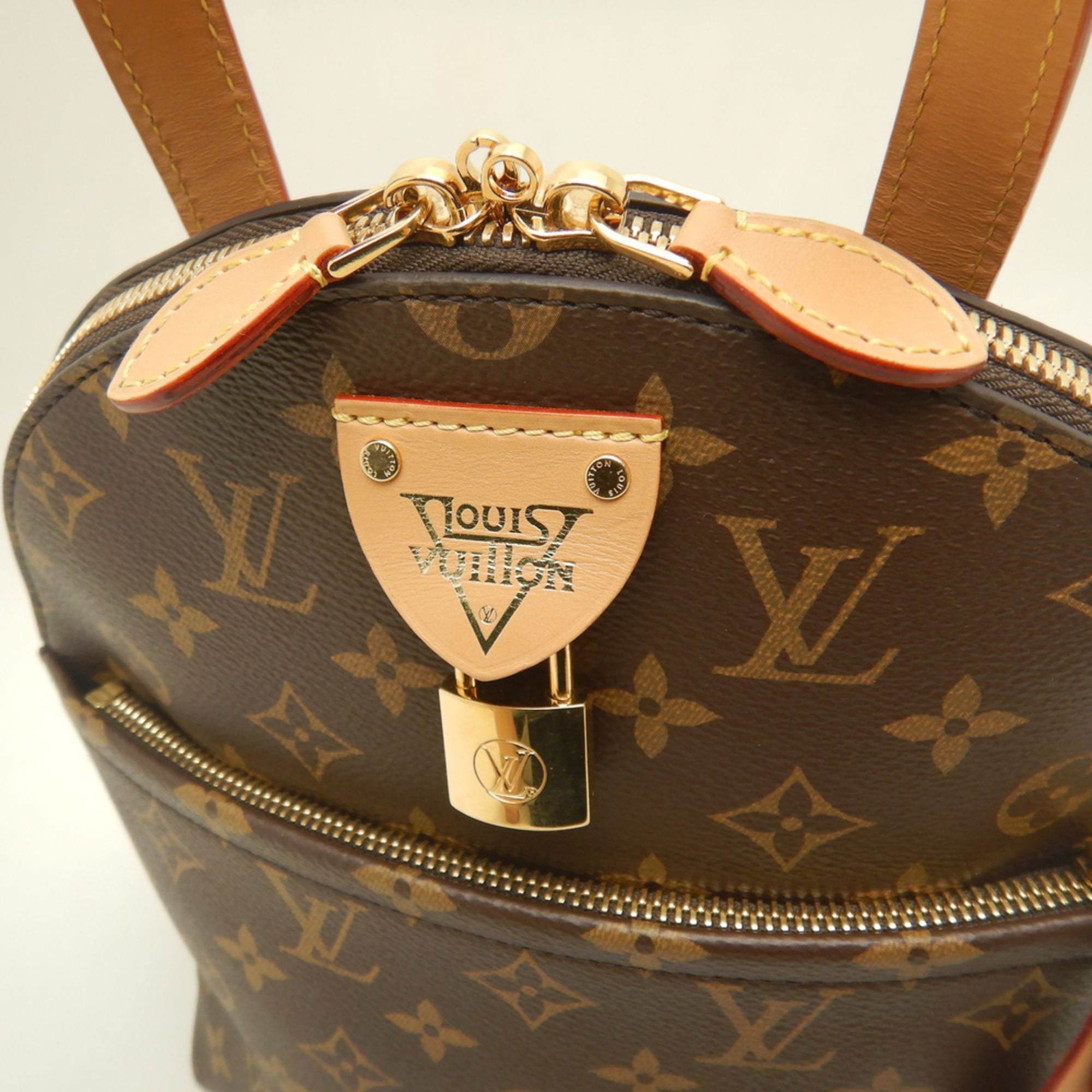 Louis Vuitton Brown Monogram Canvas Backpack (Pre-Owned)