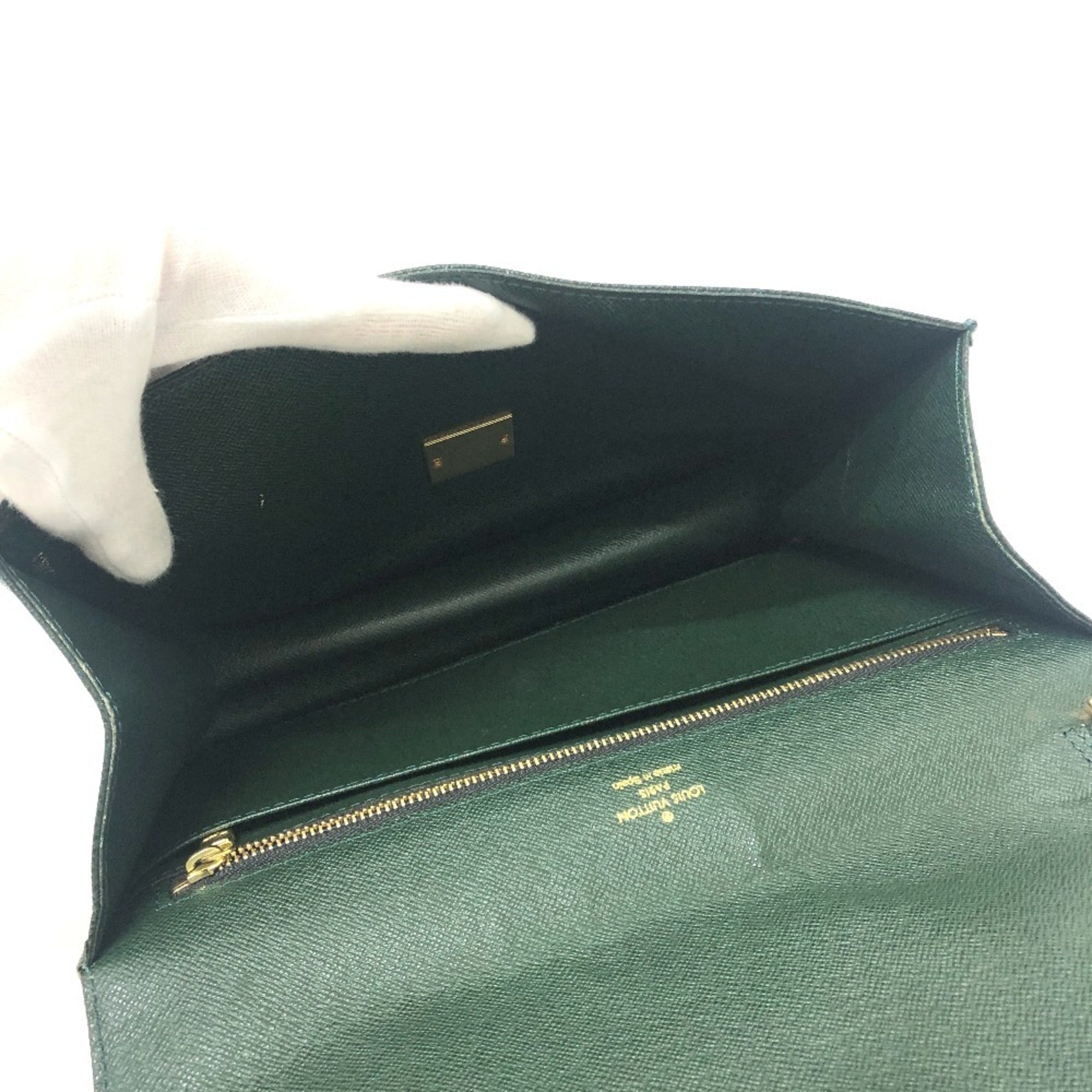 Louis Vuitton Episea Leather Taiga Leather Clutch Bag (Pre-Owned)