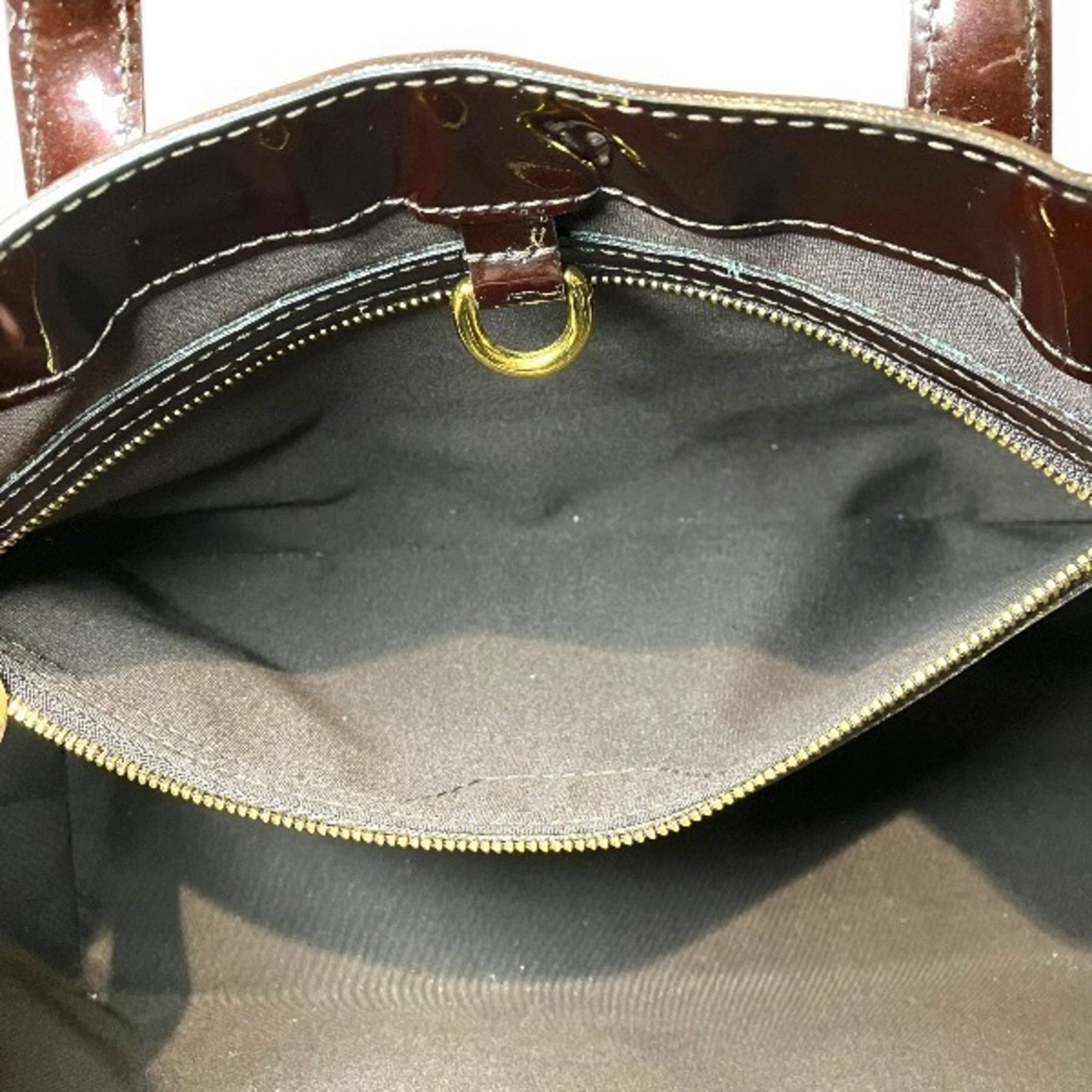 Louis Vuitton Amarante Leather Handbag (Pre-Owned)