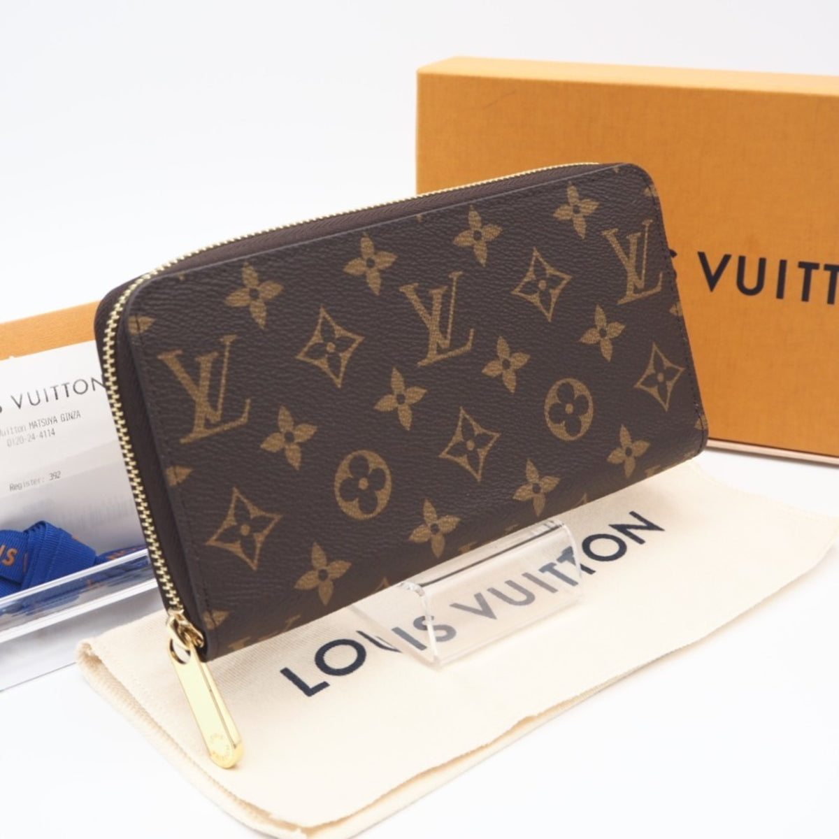 Louis Vuitton Monogram Brown Coated Canvas Long Wallet (Bi-Fold) (Pre-Owned)