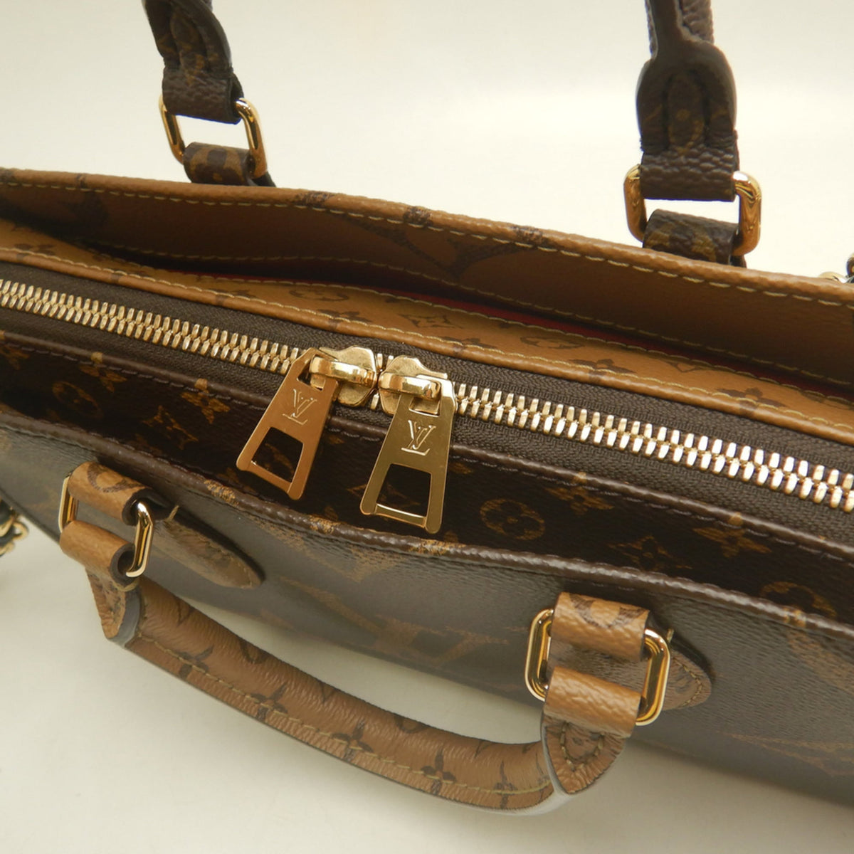 Louis Vuitton Brown Monogram Canvas Handbag (Pre-Owned)
