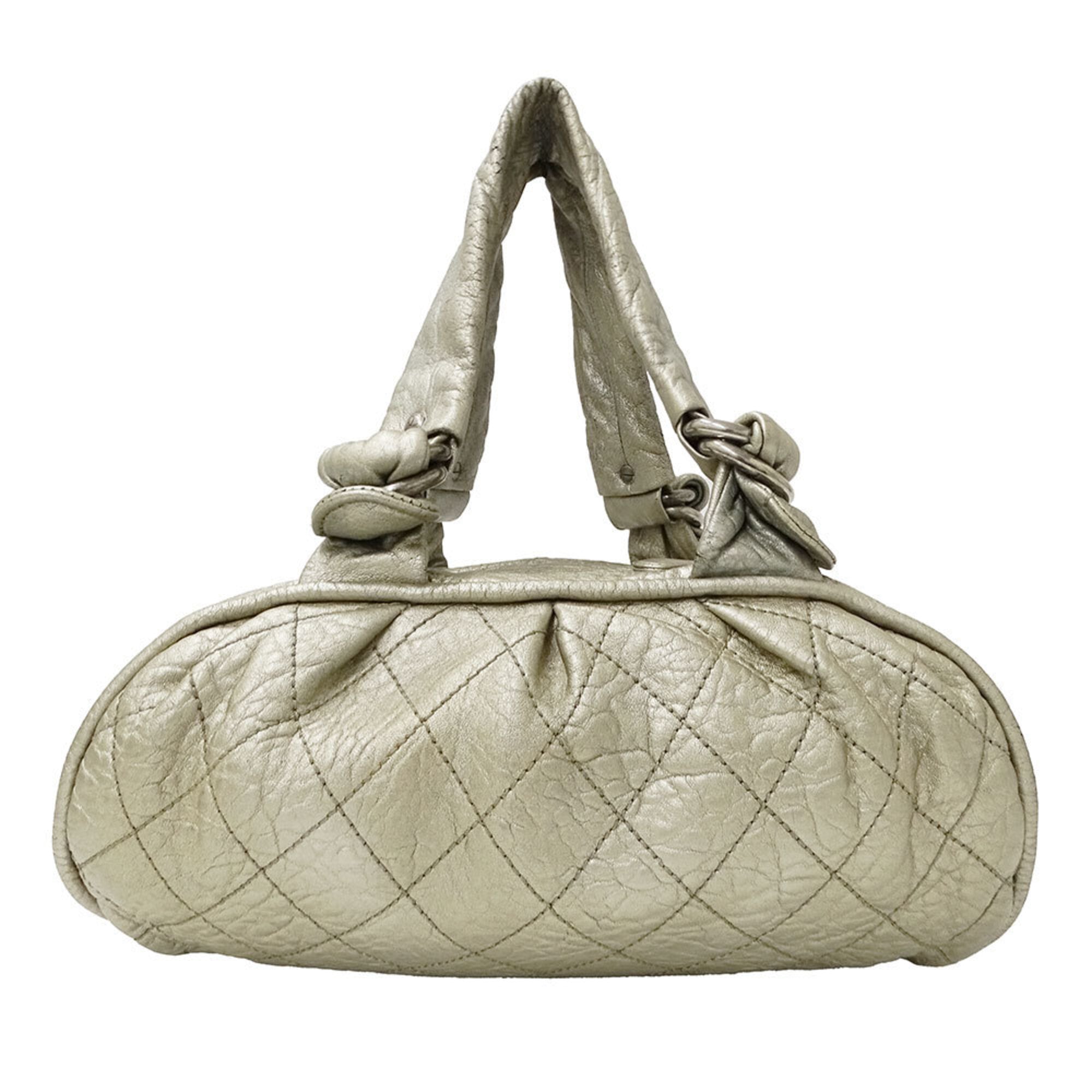 Chanel Champagne Gold Leather Handbag (Pre-Owned)