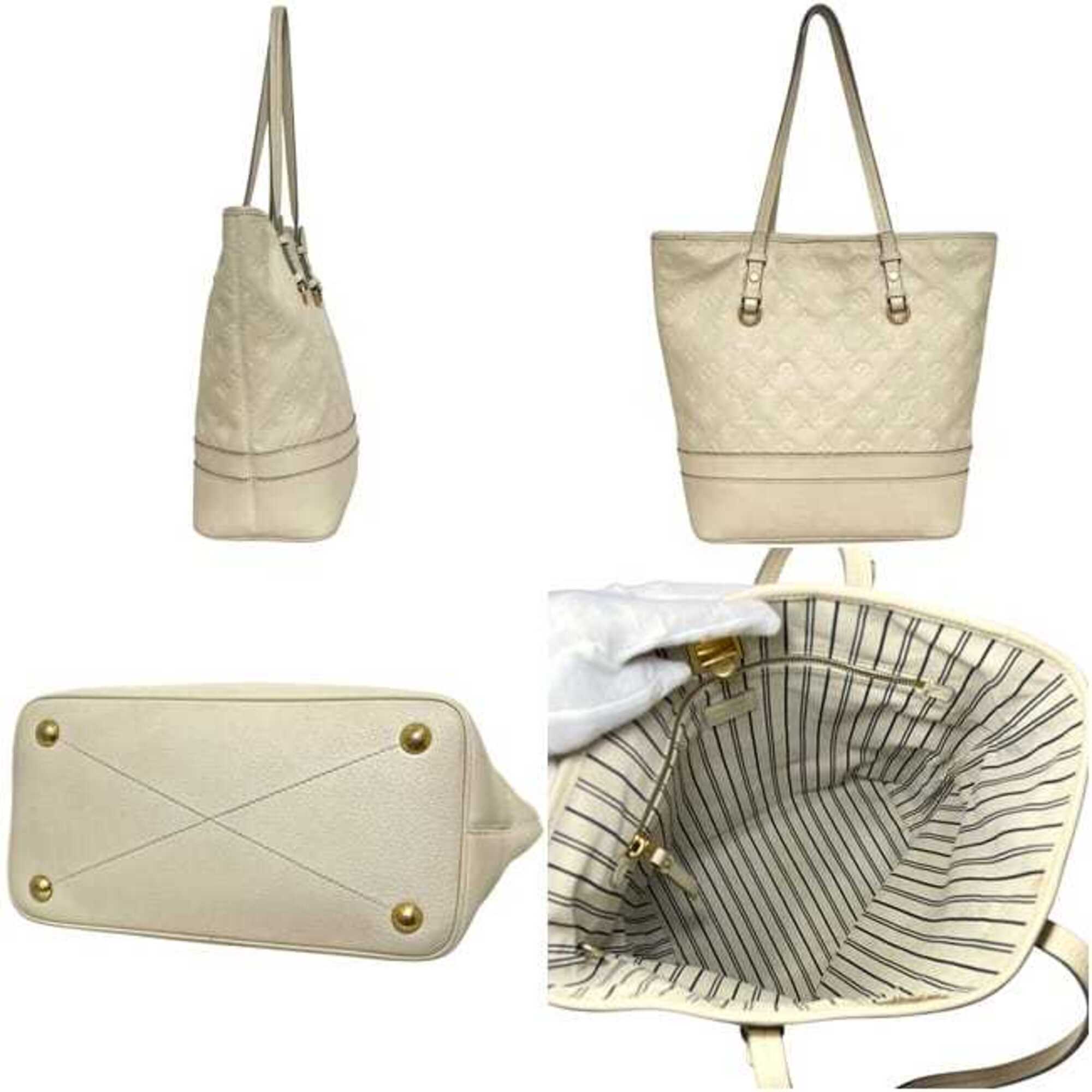 Louis Vuitton Beige Neige White Monogram Empreinte Leather Tote Bag (Pre-Owned)