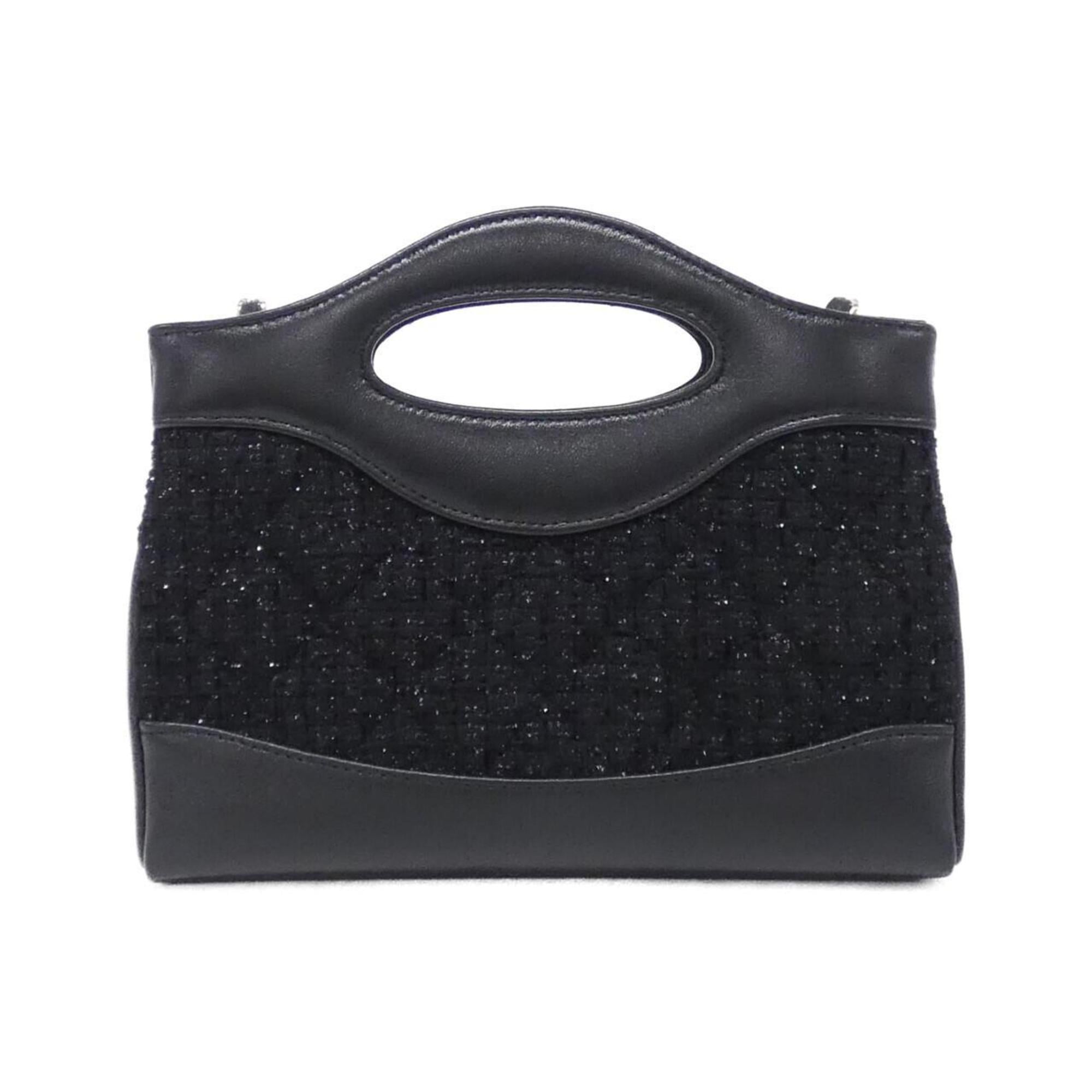 Chanel Black Cotton Leather Handbag (Pre-Owned)