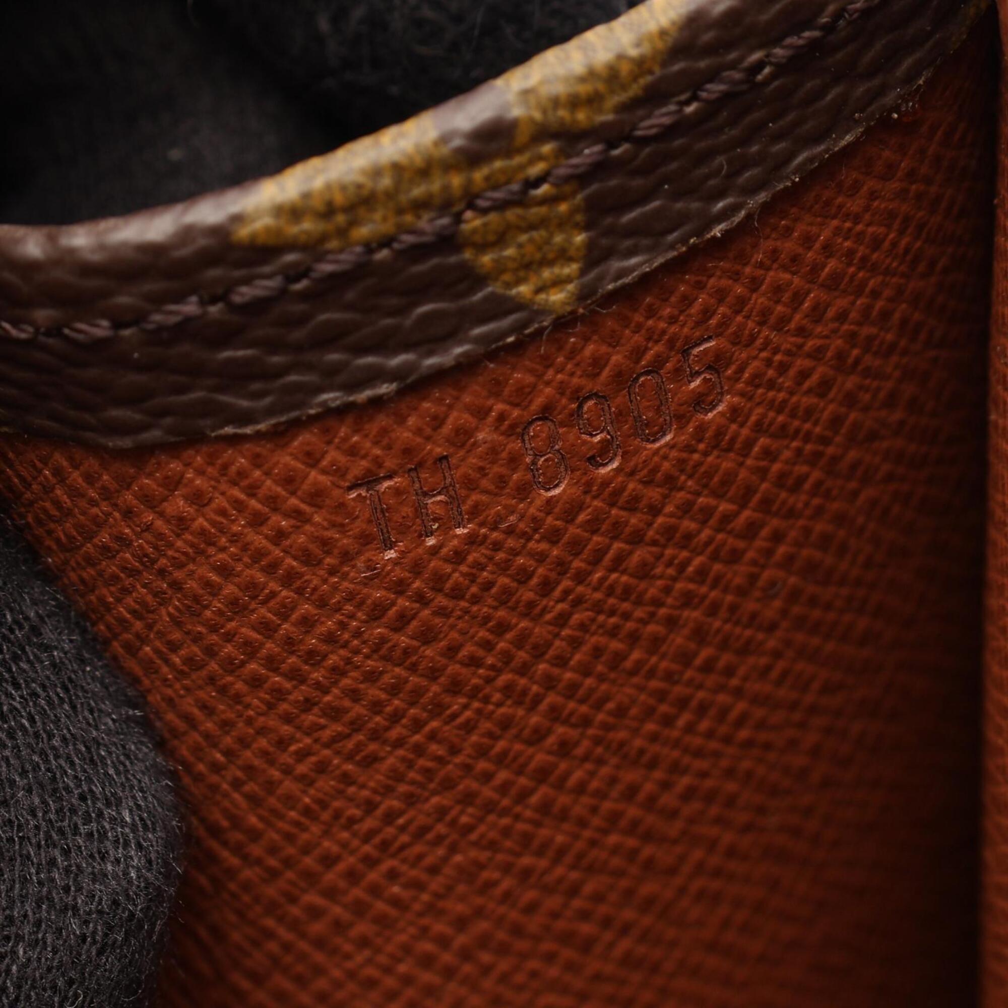 Louis Vuitton Brown Coated Canvas Clutch Bag Handbag (Pre-Owned)
