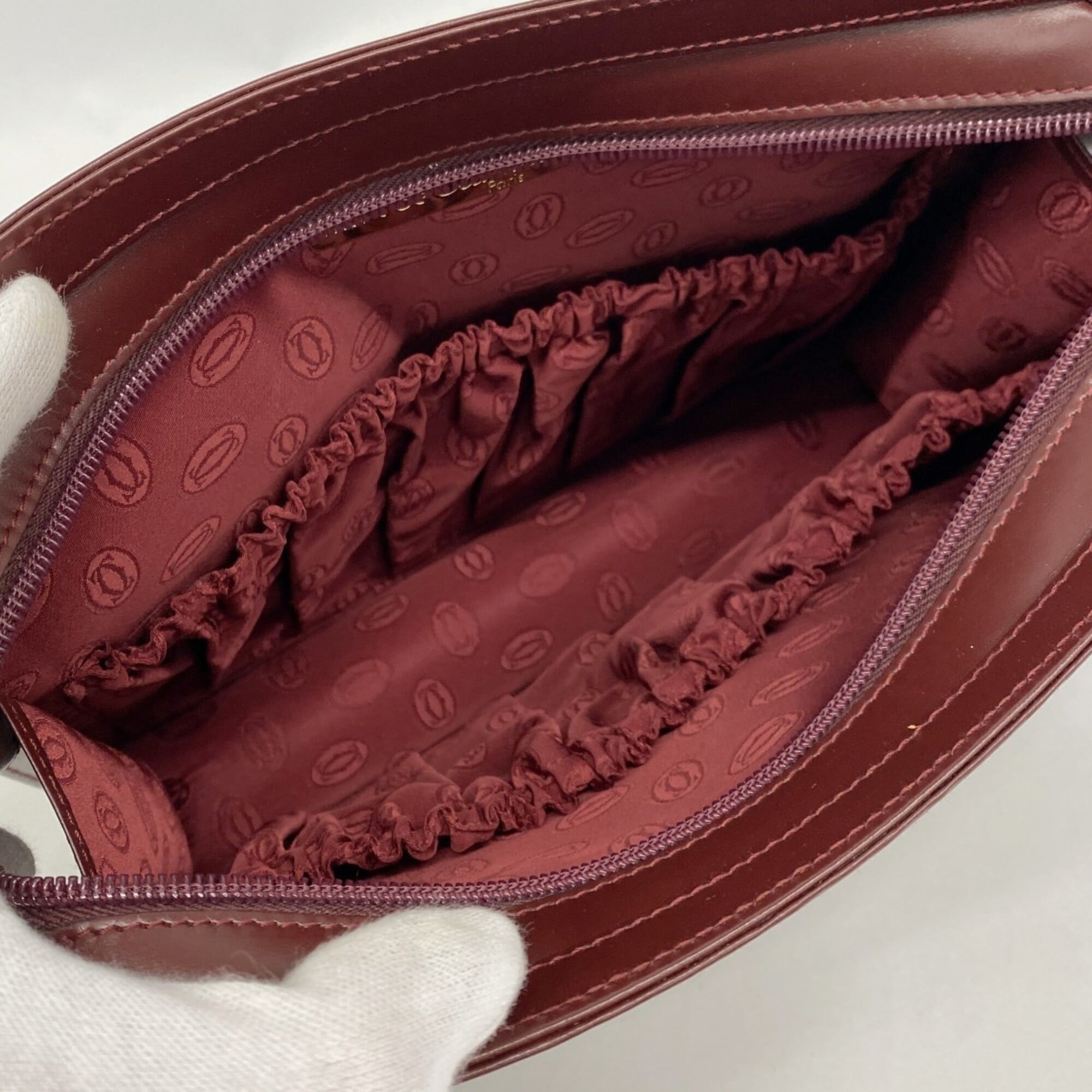 Cartier Bordeaux Leather Clutch Bag (Pre-Owned)