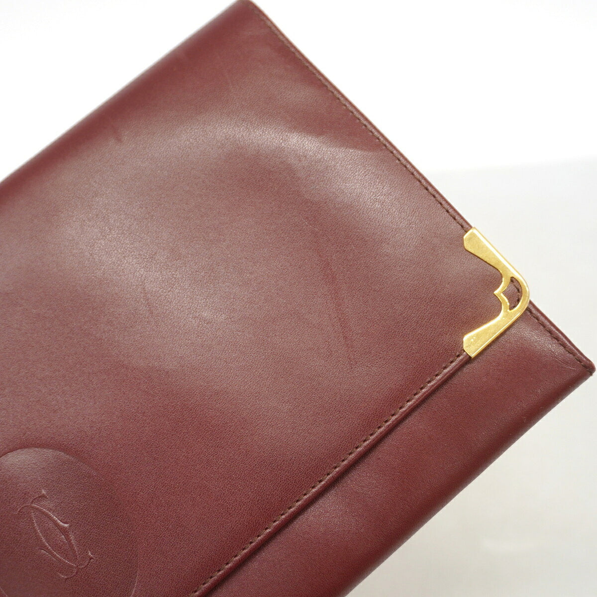 Cartier Bordeaux Leather Clutch Bag (Pre-Owned)