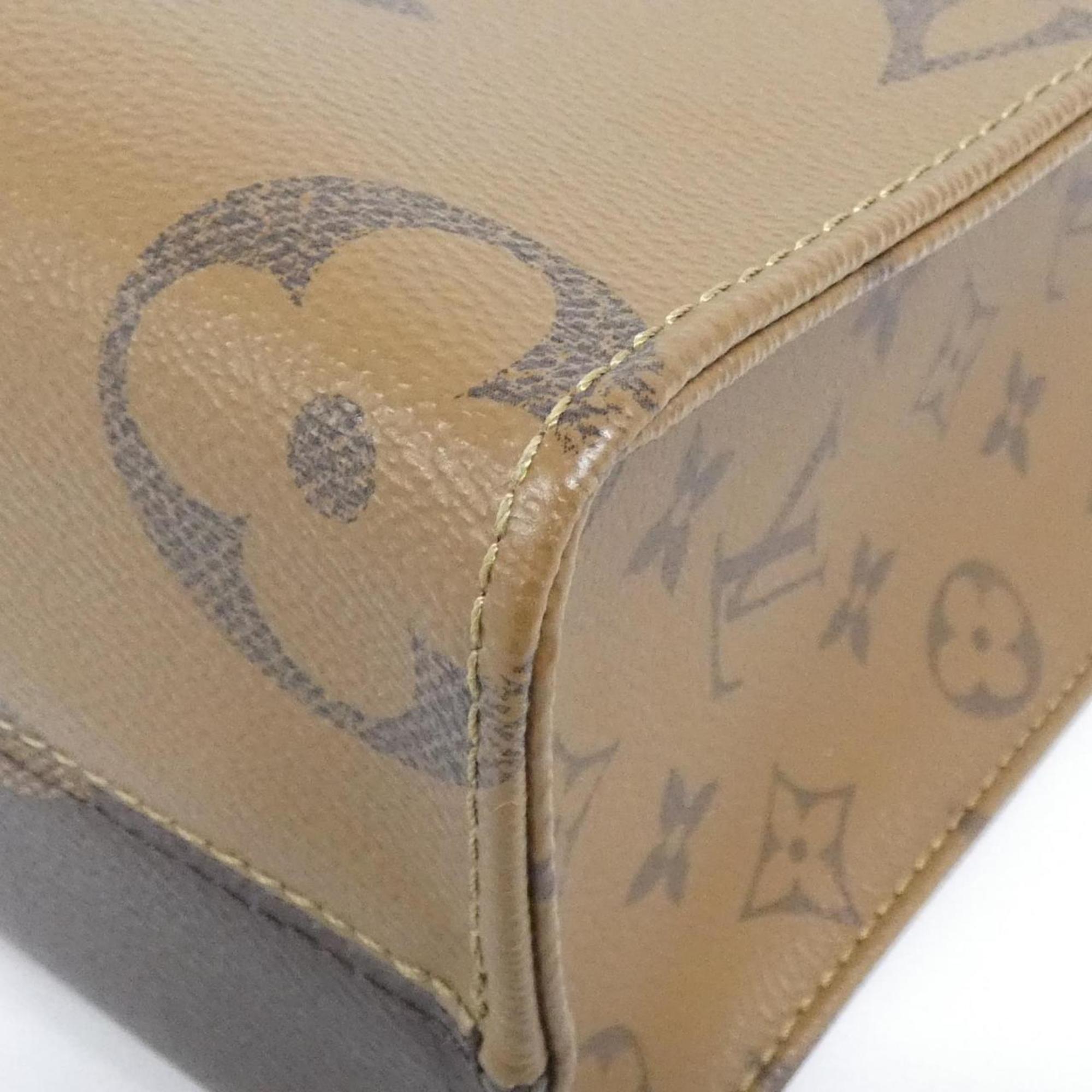 Louis Vuitton Brown Coated Canvas Handbag (Pre-Owned)