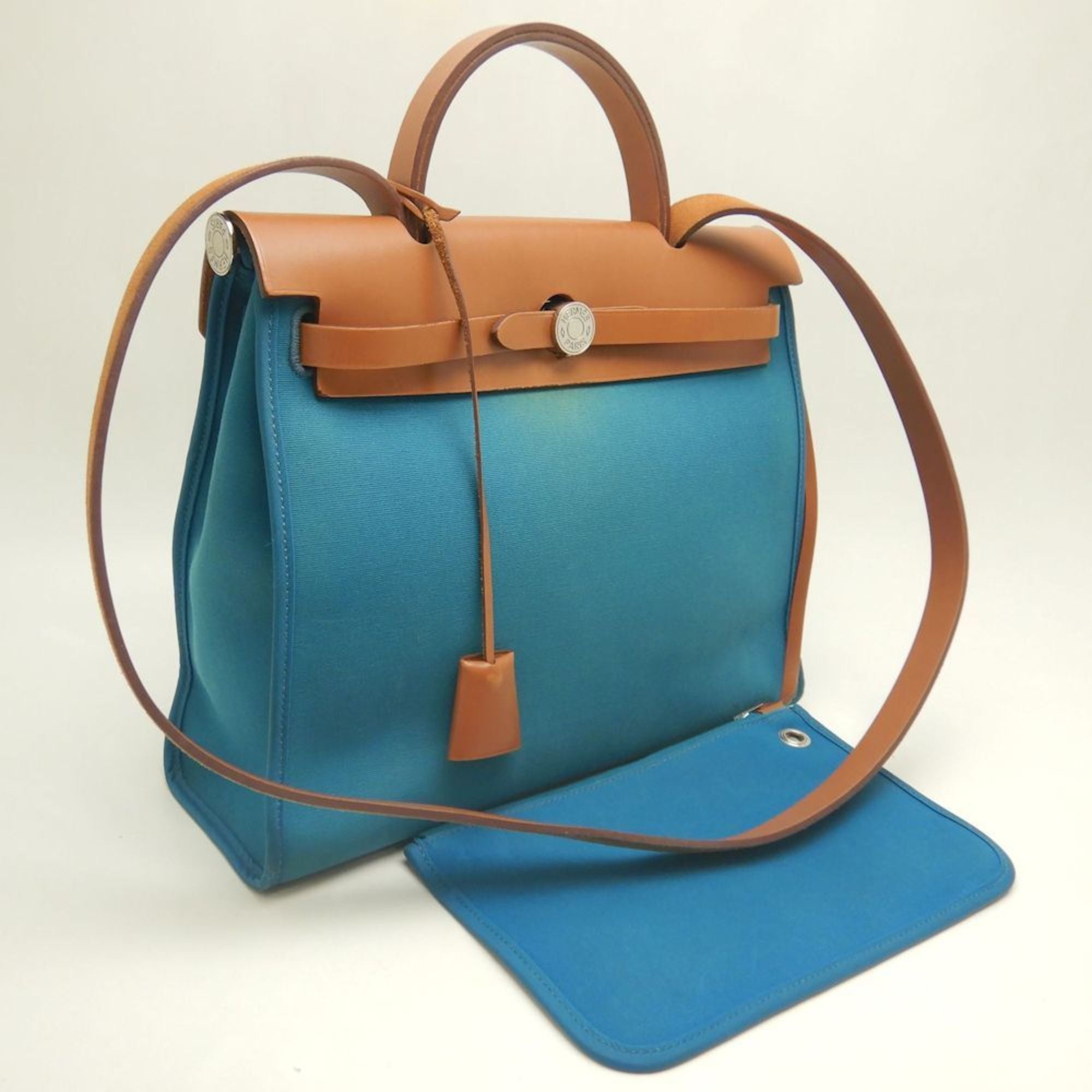 Hermes Her Bag Turquoise Blue Toile Officier Leather Handbag (Pre-Owned)