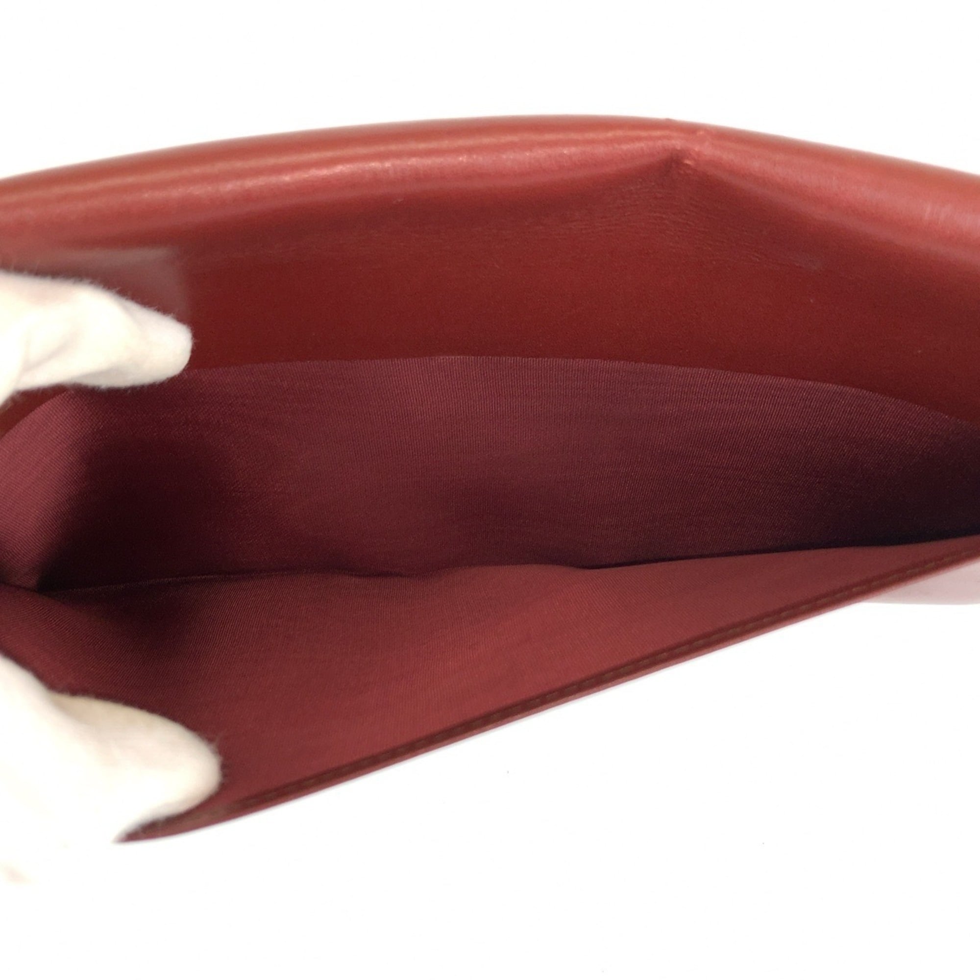 Cartier Wine Red Leather Clutch Bag (Pre-Owned)