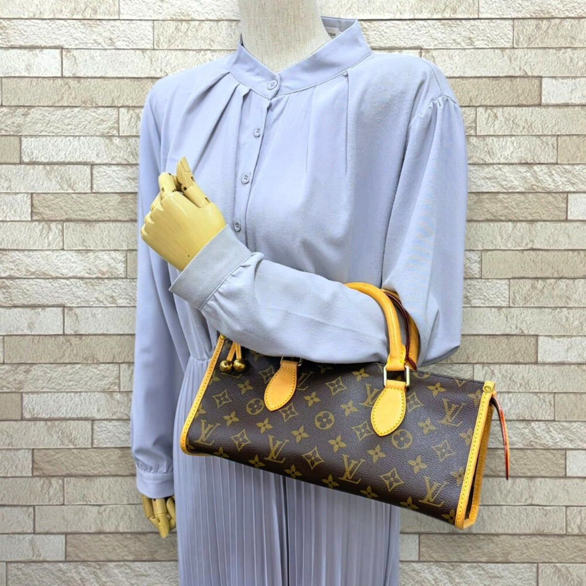 Louis Vuitton Brown Monogram Handbag (Pre-Owned)