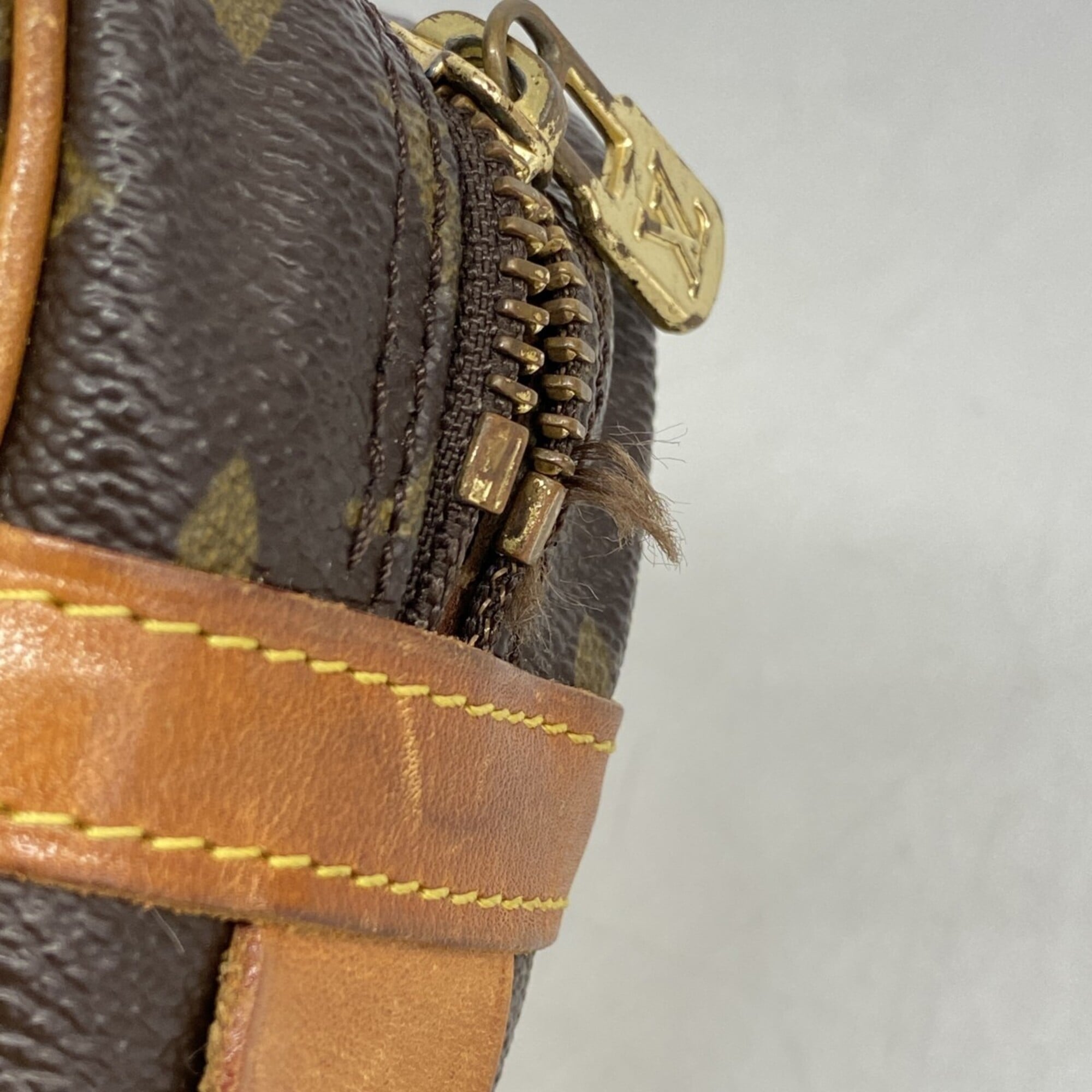 Louis Vuitton Brown Clutch Bag (Pre-Owned)