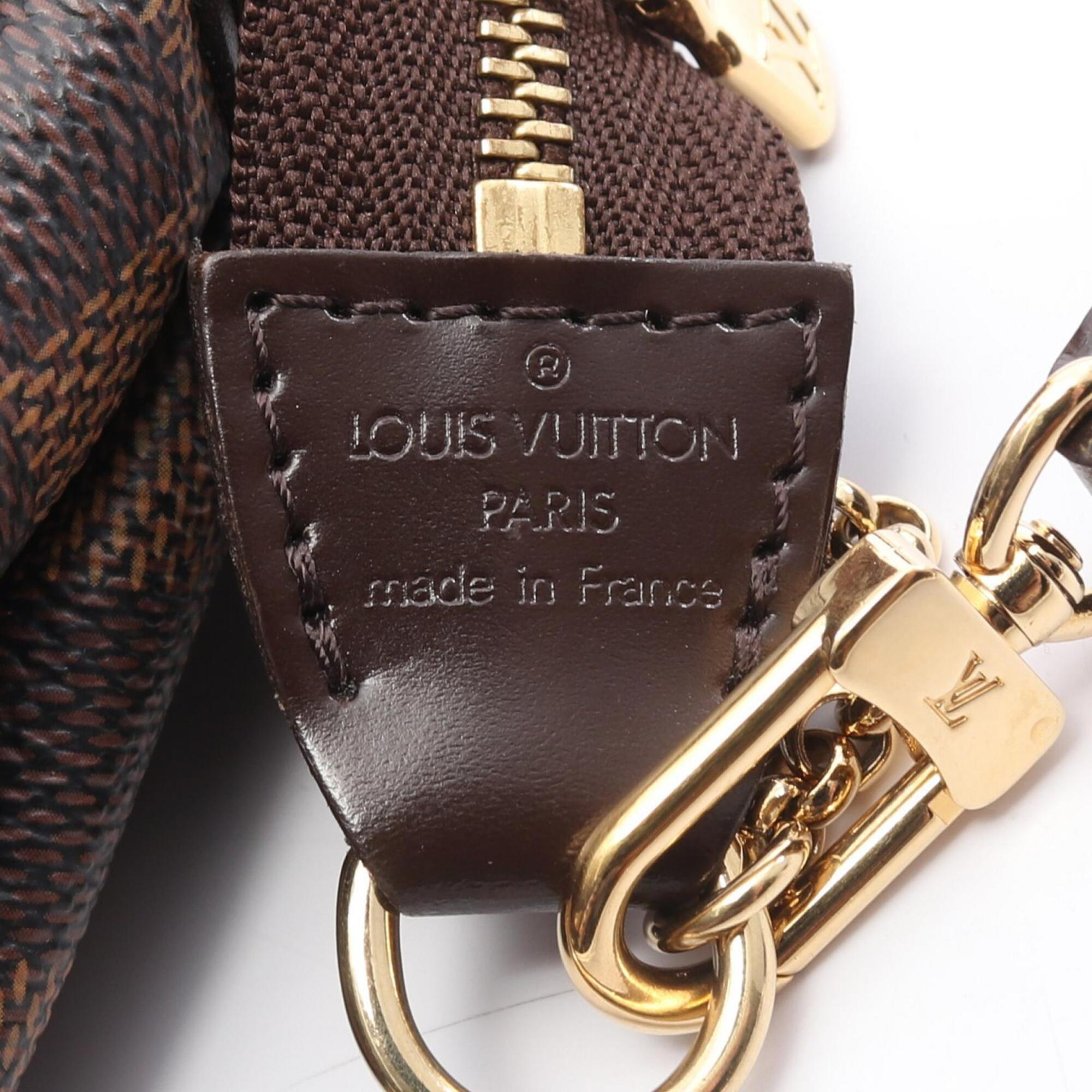 Louis Vuitton Brown Coated Canvas Leather Handbag (Pre-Owned)
