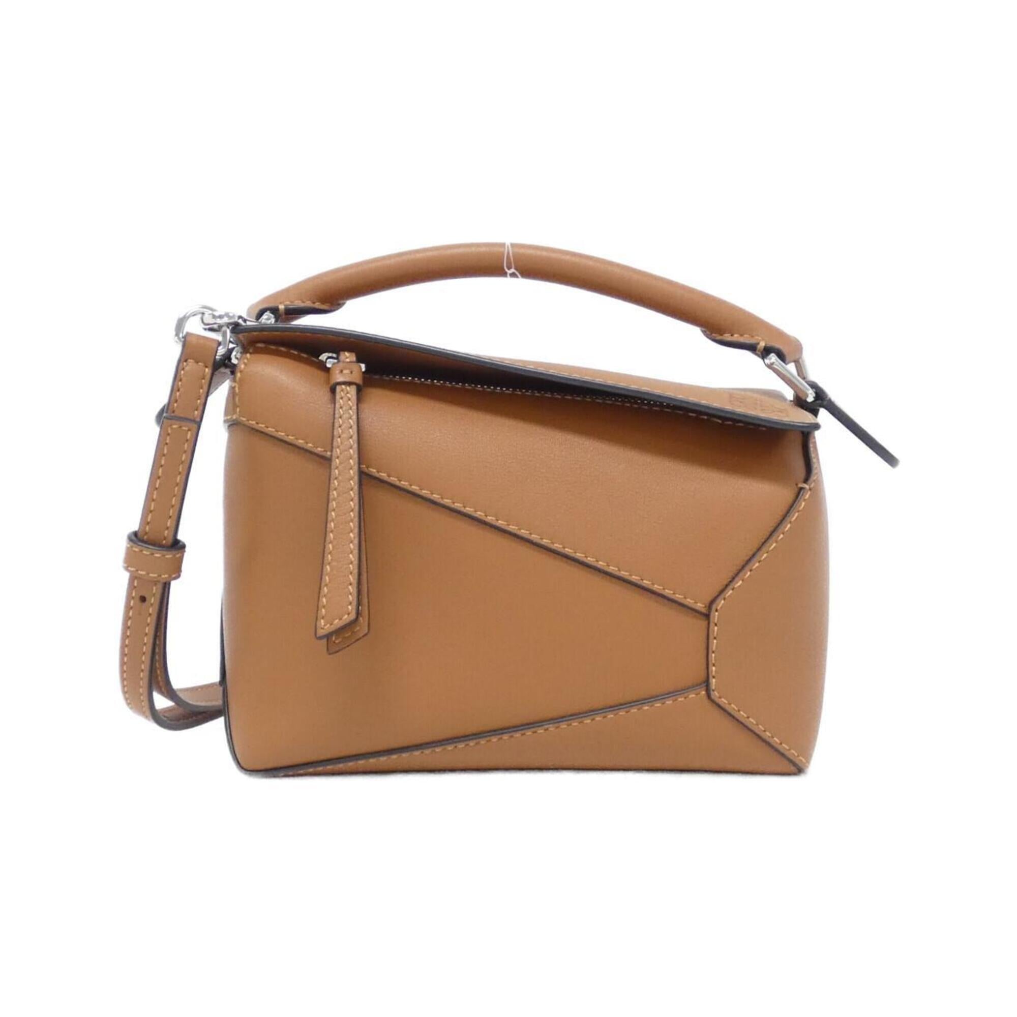 Loewe Puzzle Silver Leather Handbag (Pre-Owned)