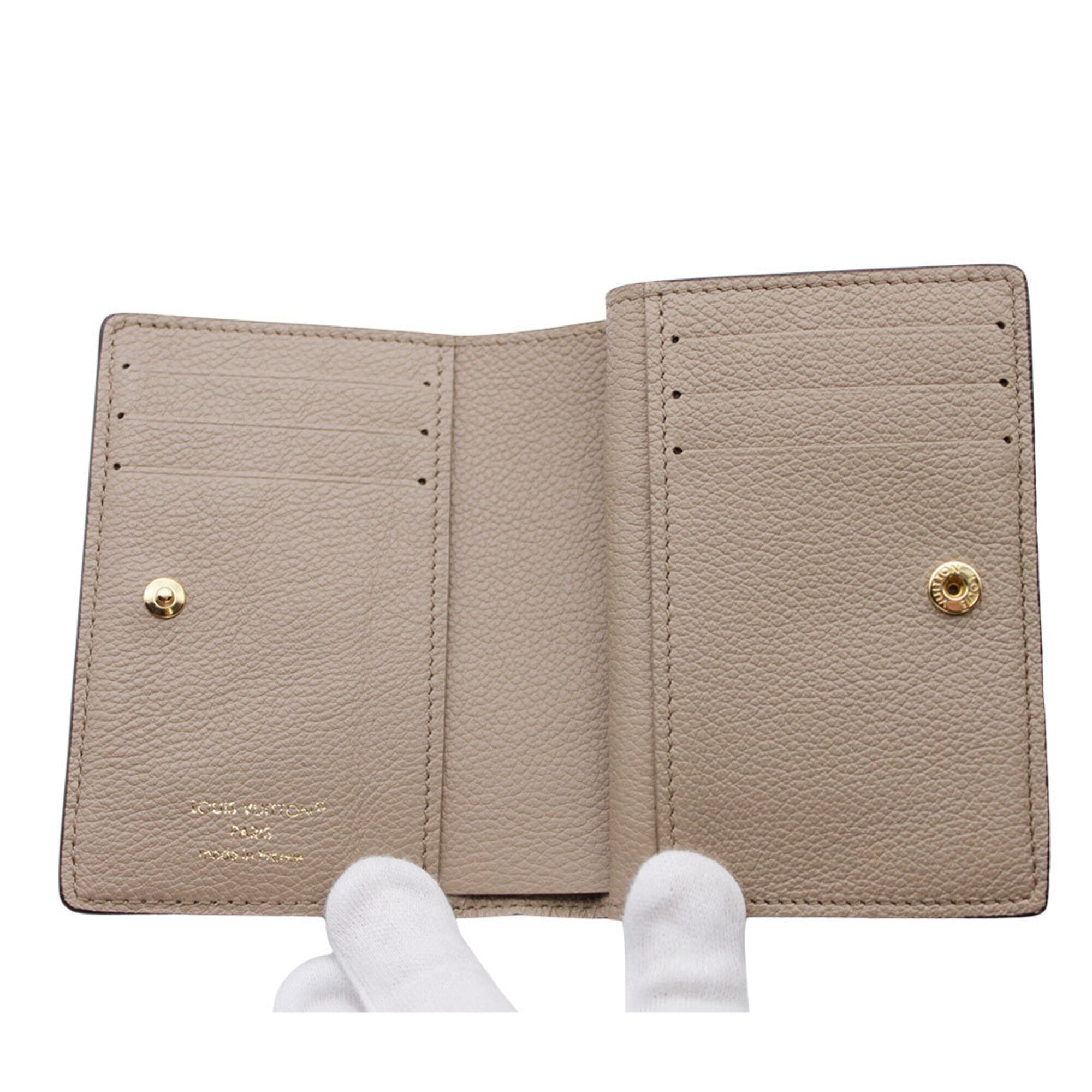 Louis Vuitton Monogram Empreinte Beige Black Monogram Empreinte Wallet (Bi-Fold) (Pre-Owned)