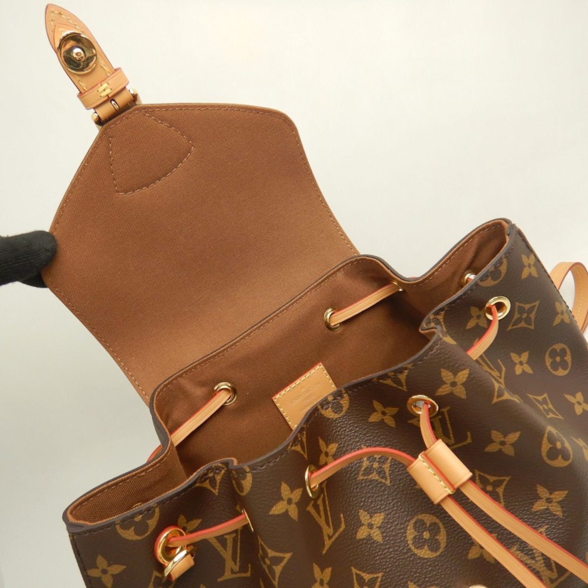 Louis Vuitton Brown Monogram Monogram Pvc Backpack (Pre-Owned)