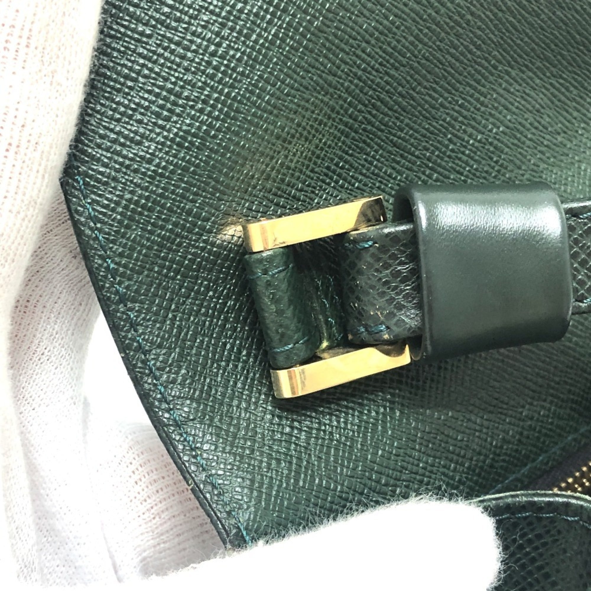 Louis Vuitton Episea Leather Taiga Leather Clutch Bag (Pre-Owned)