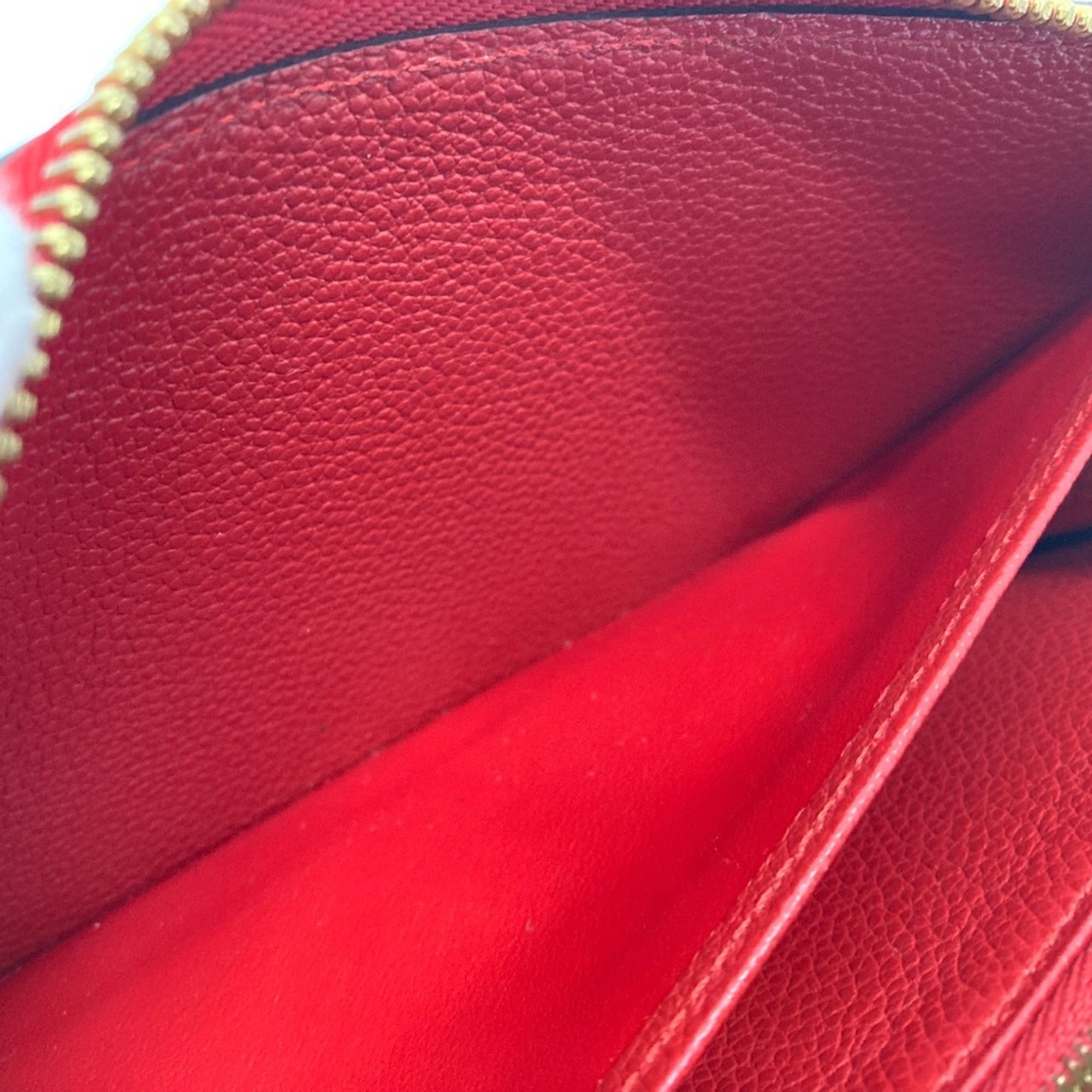 Louis Vuitton Monogram Empreinte Cerise Red Color Monogram Empreinte Long Wallet (Bi-Fold) (Pre-Owned)