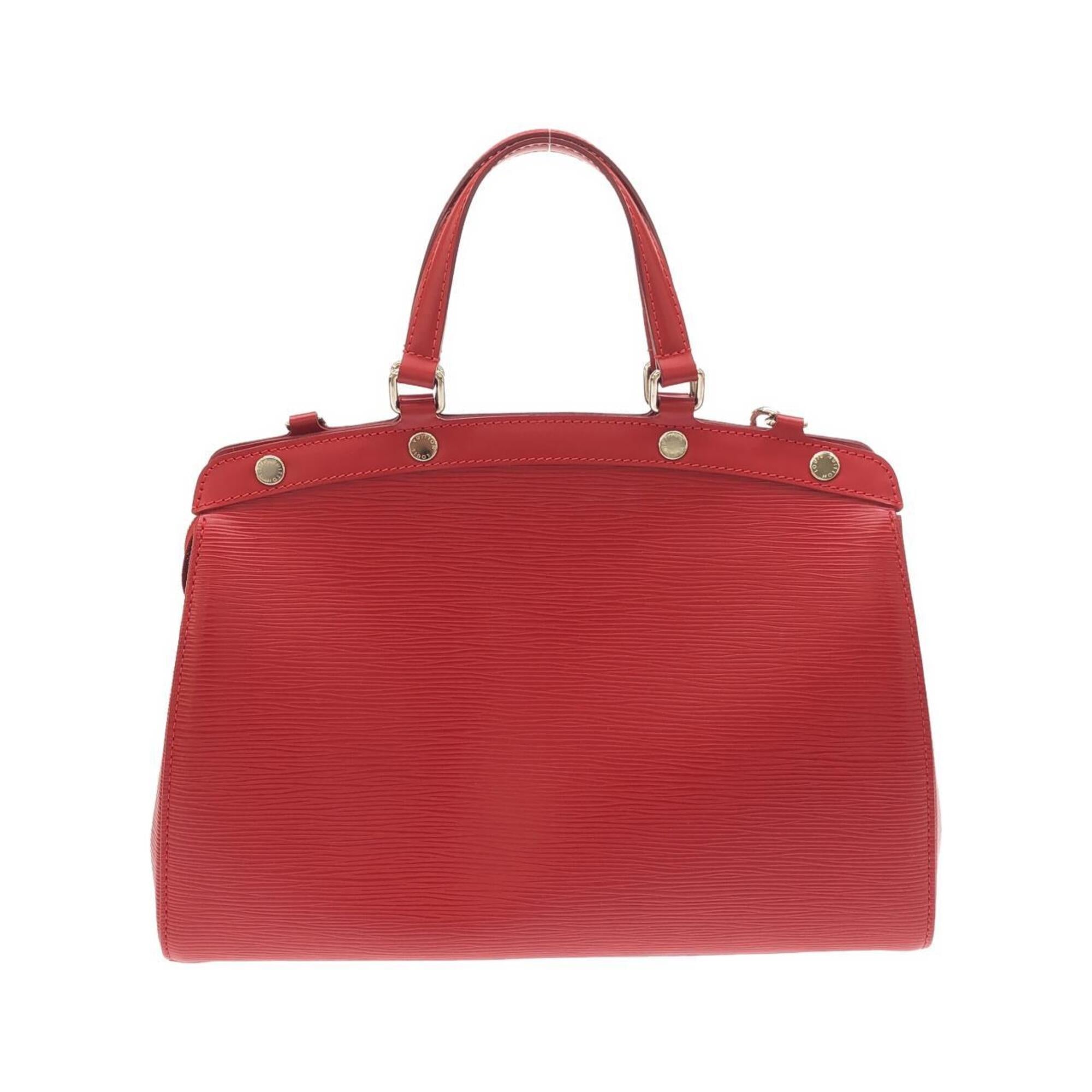 Louis Vuitton Carmine Red Color Leather Handbag (Pre-Owned)