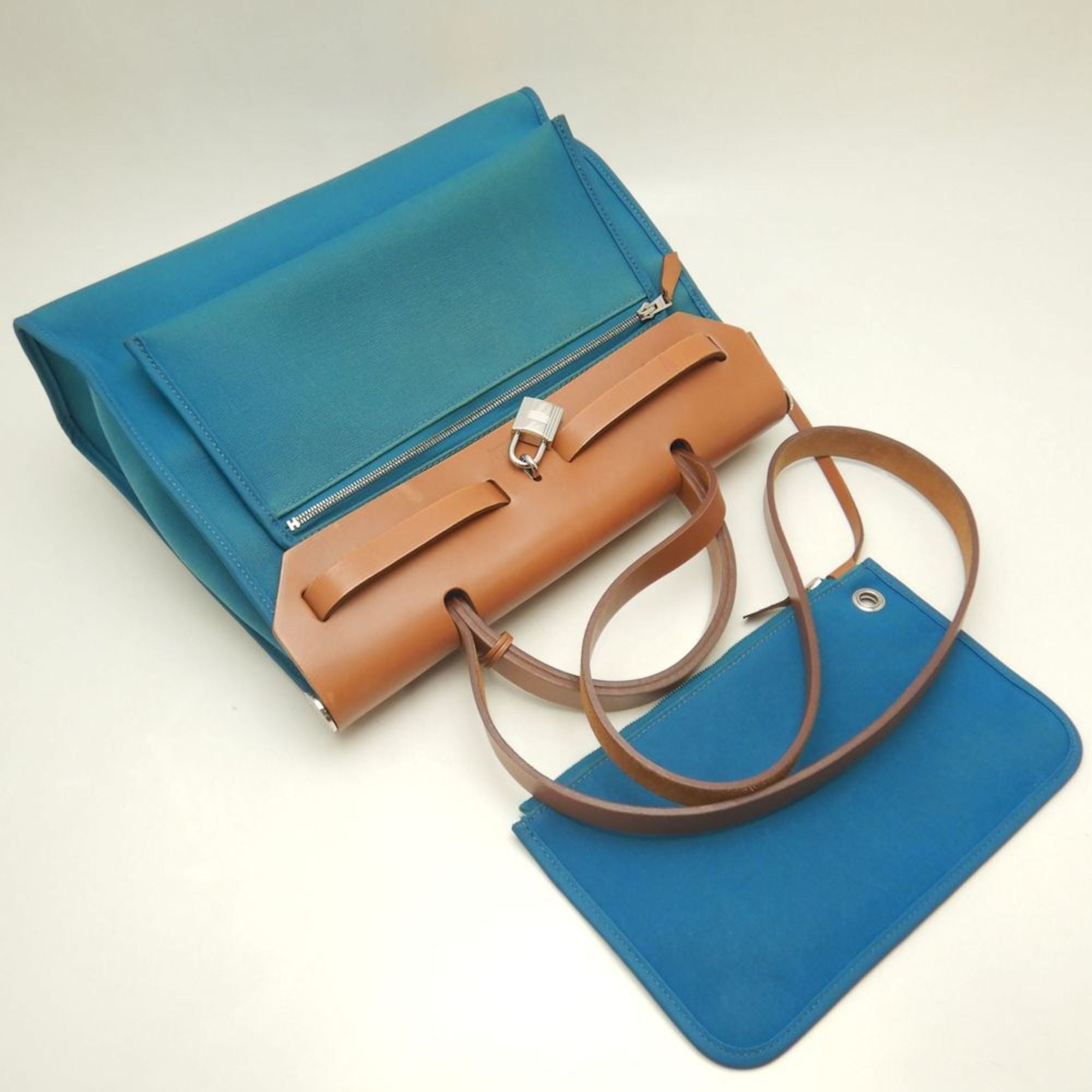 Hermes Her Bag Turquoise Blue Toile Officier Leather Handbag (Pre-Owned)