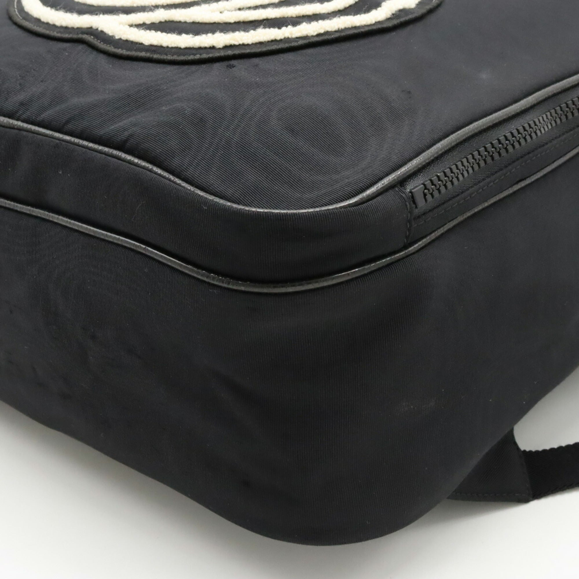 Gucci Black Nylon Canvas Spangles Leather Backpack (Pre-Owned)