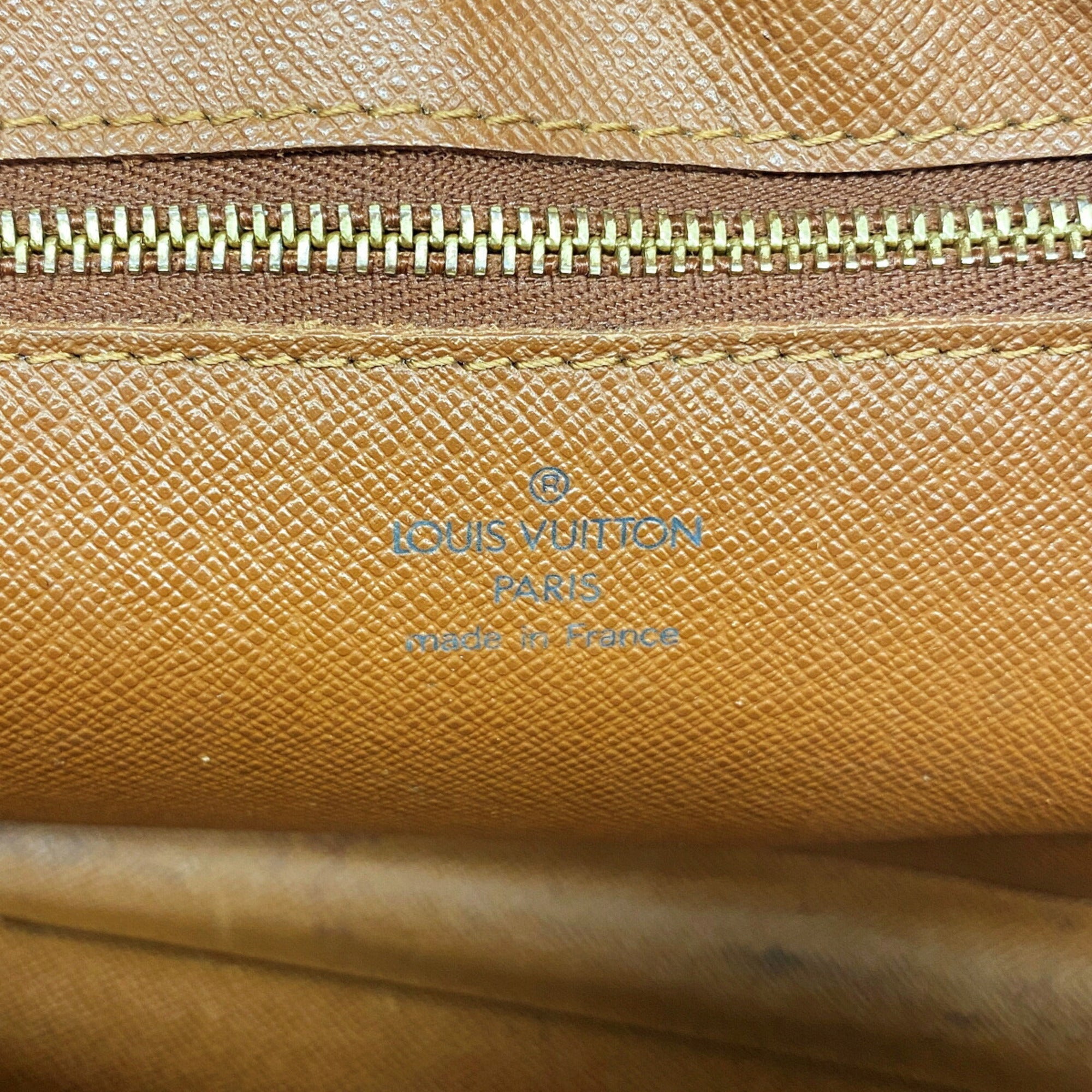 Louis Vuitton Brown Clutch Bag (Pre-Owned)