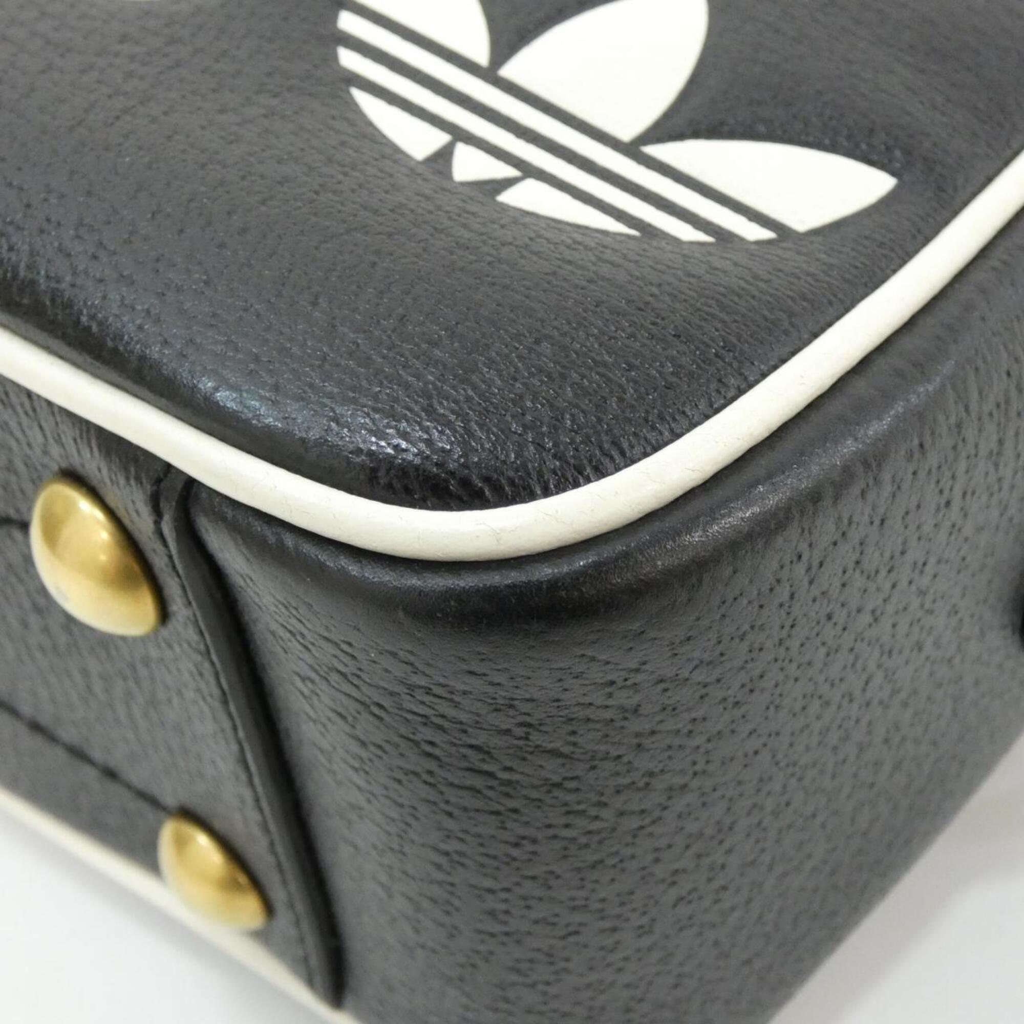 Gucci Black White Leather Shoulder Bag (Pre-Owned)