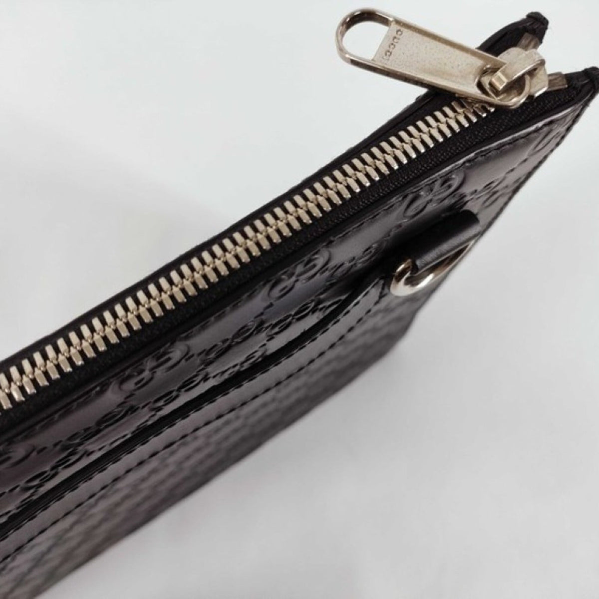 Gucci Guccissima Black Leather Clutch Bag (Pre-Owned)