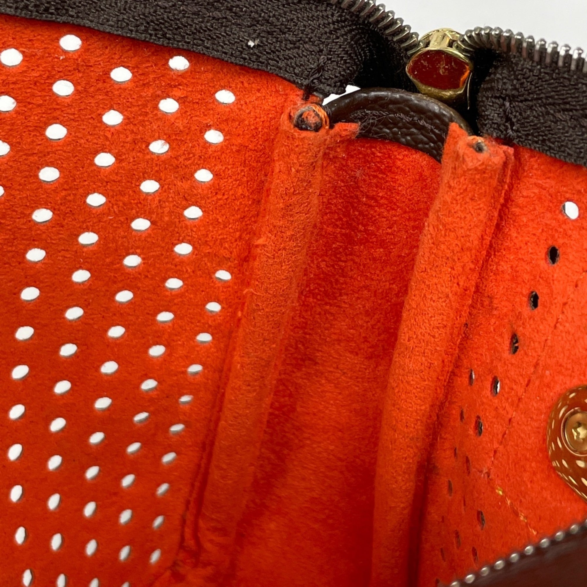 Louis Vuitton Monogram Perfo Lv Orange Orange Monogram Perforated Handbag Pochette (Pre-Owned)