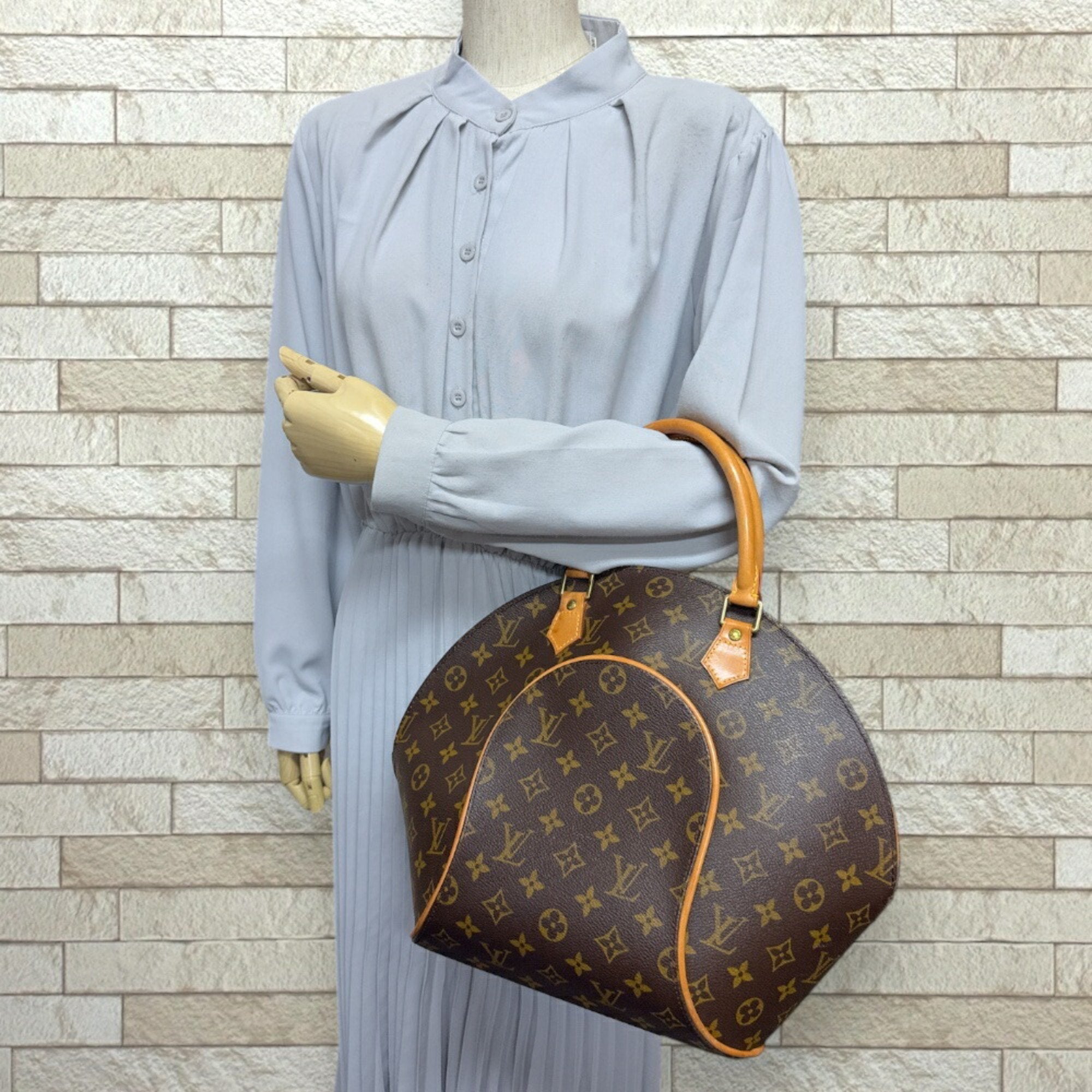 Louis Vuitton Brown Monogram Canvas Handbag (Pre-Owned)