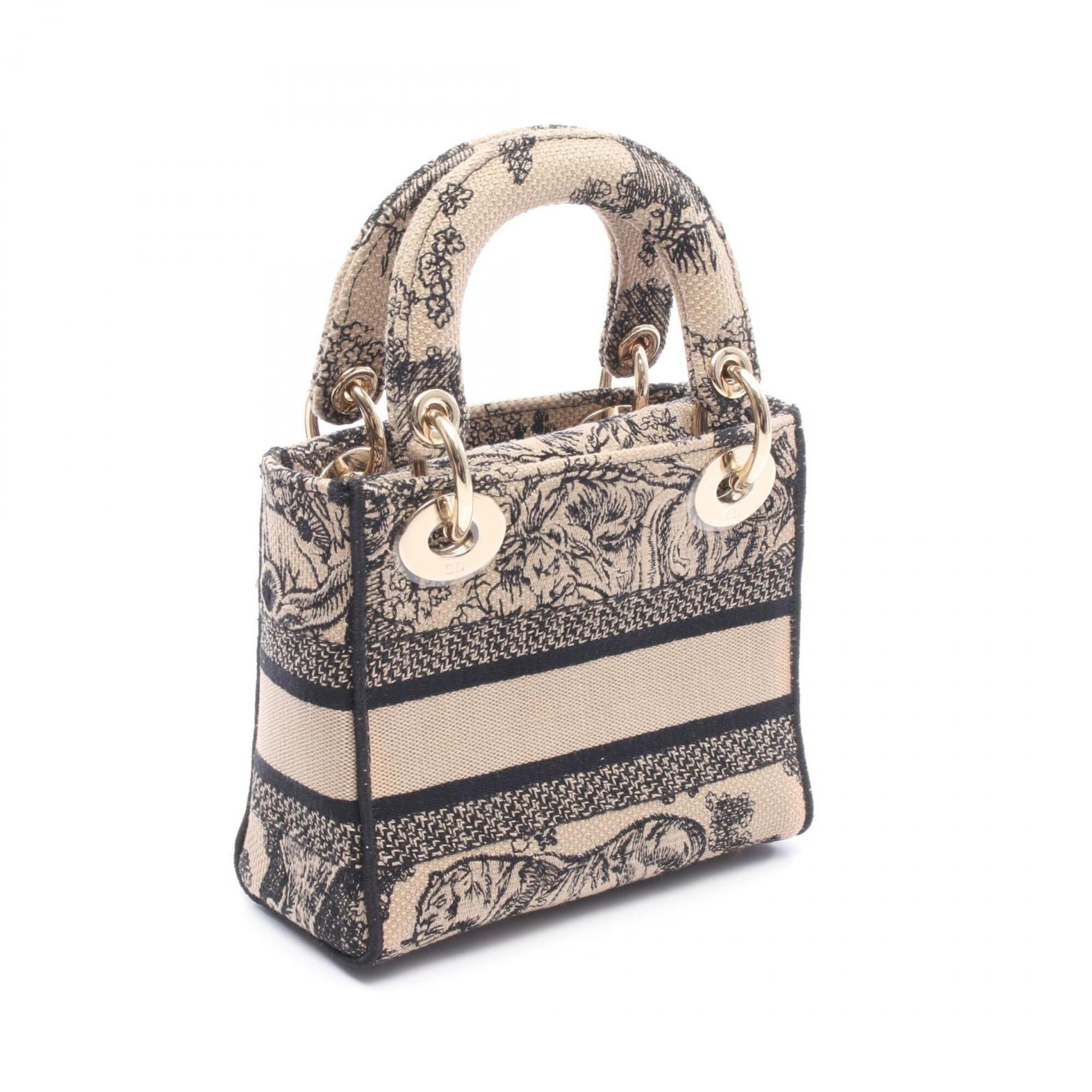 Christian Dior Beige Black Canvas Handbag (Pre-Owned)