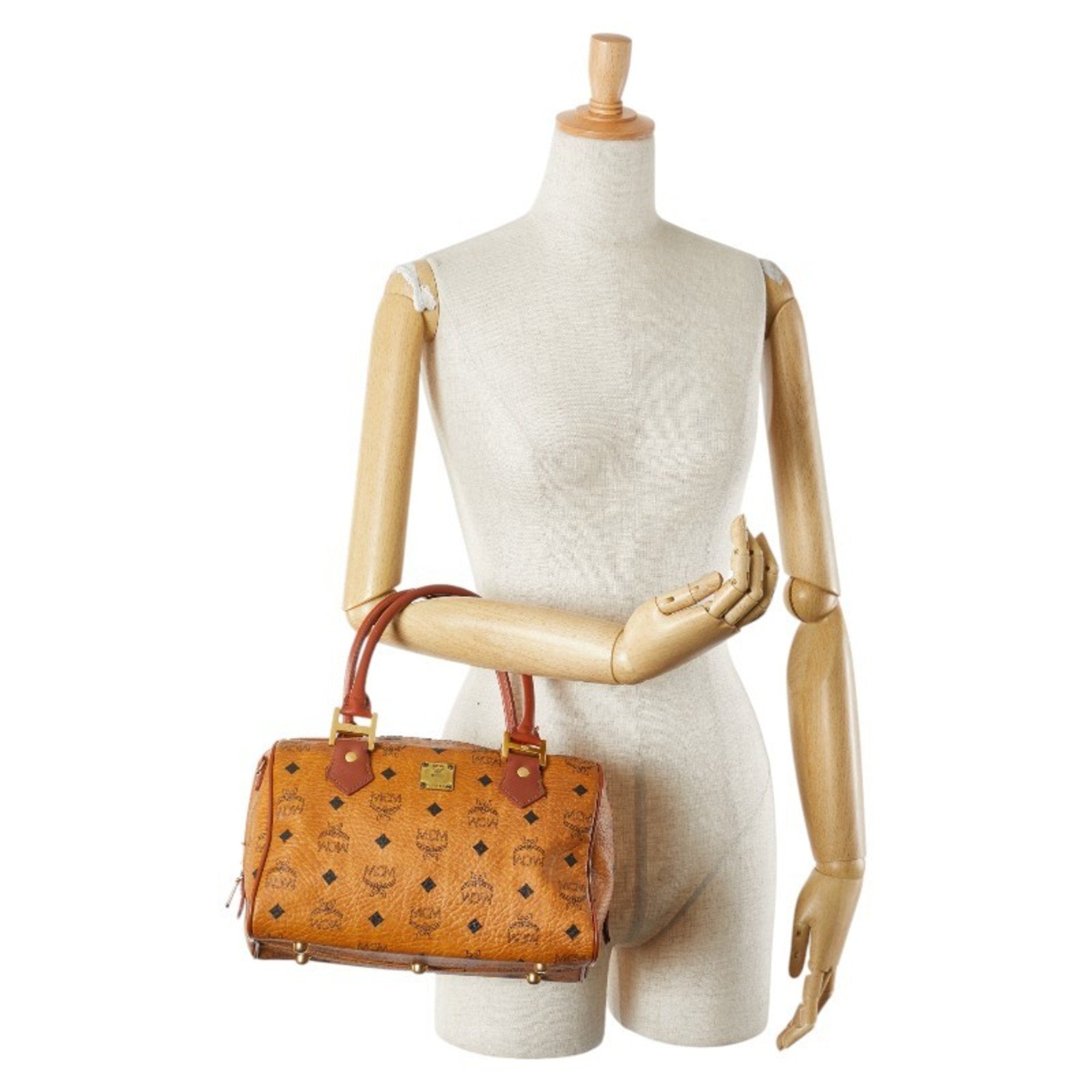 Mcm Brown Pvc Leather Handbag (Pre-Owned)