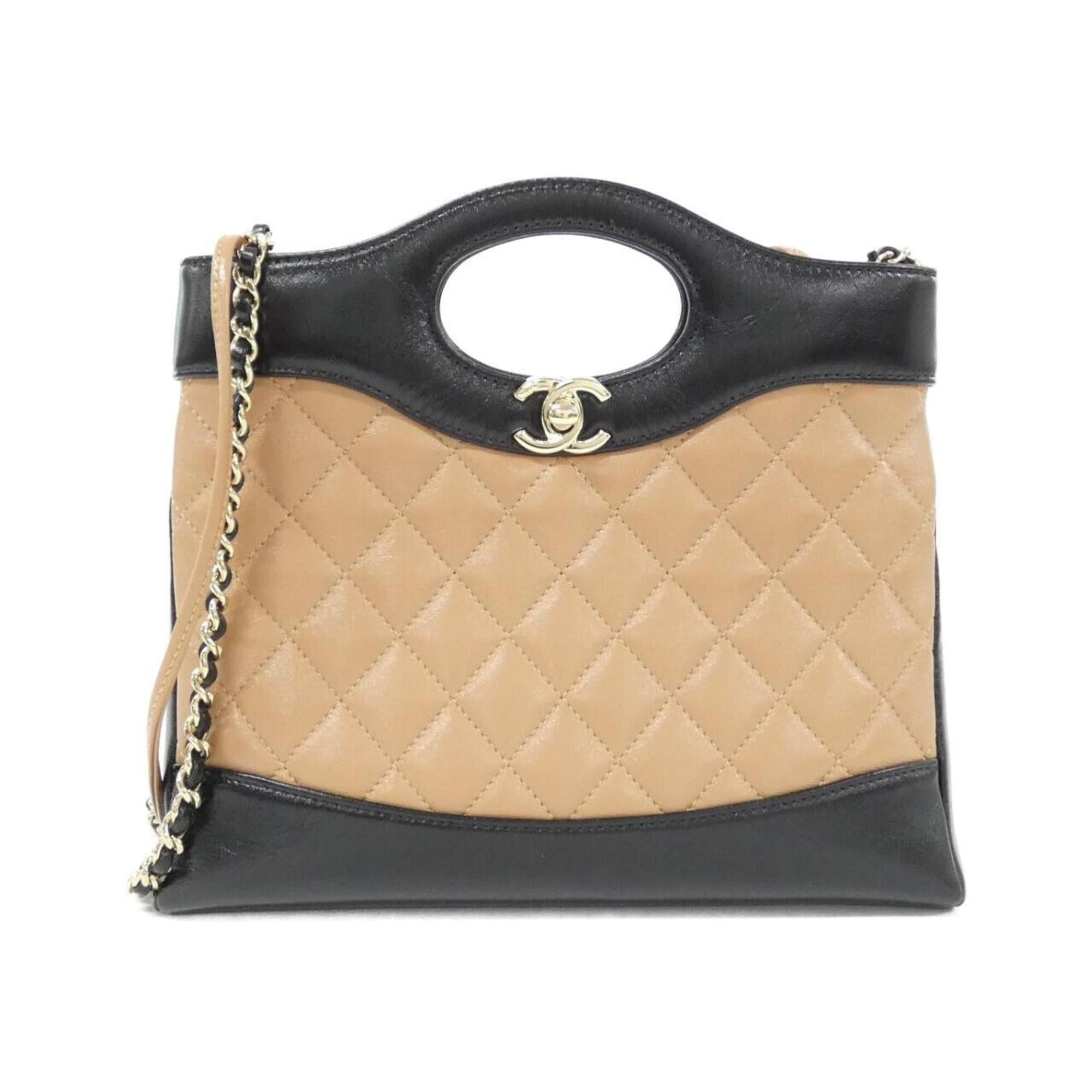 Chanel Beige Black Leather Handbag (Pre-Owned)