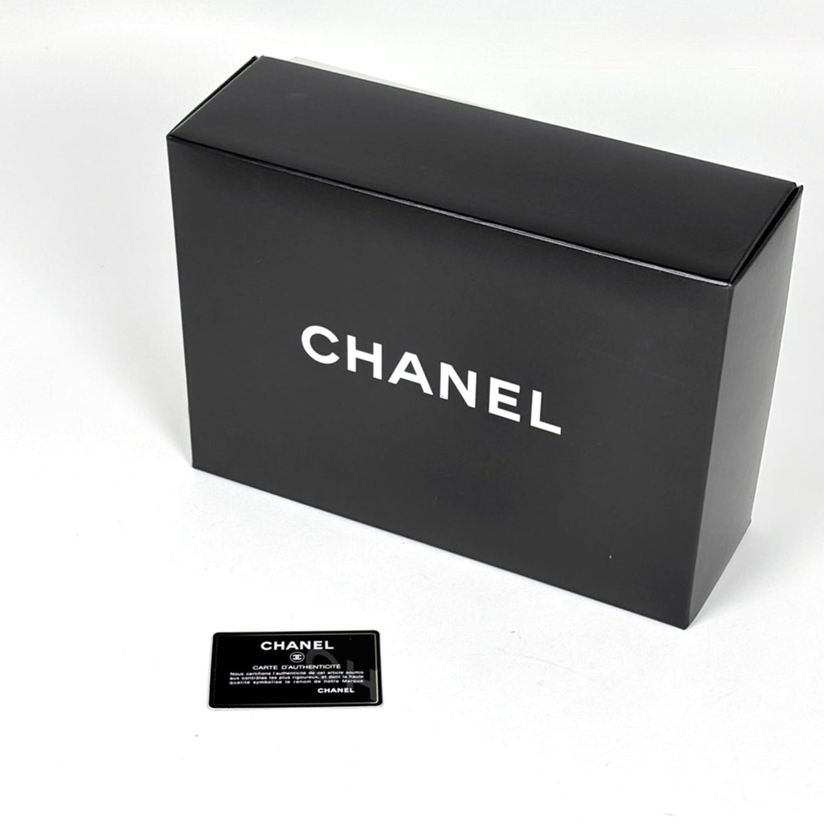 Chanel Black Leather Satin Handbag (Pre-Owned)