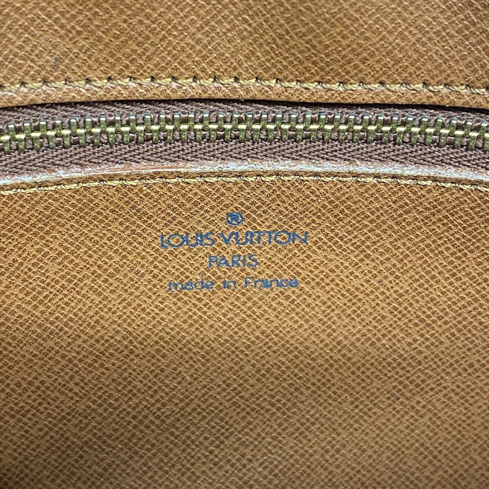 Louis Vuitton Brown Clutch Bag (Pre-Owned)