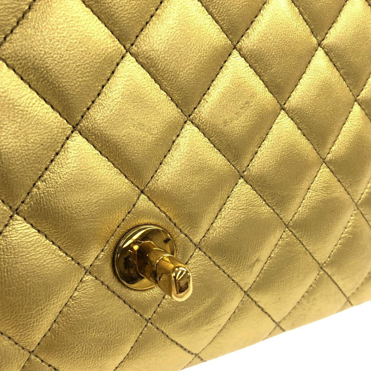 Chanel Gold Leather Handbag (Pre-Owned)