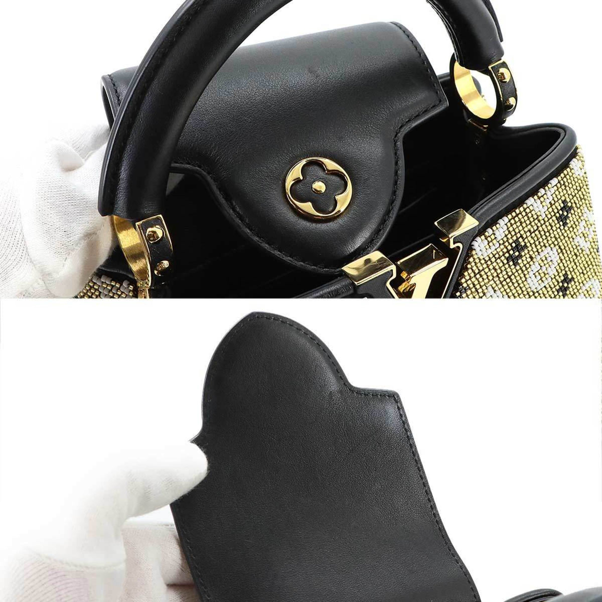 Louis Vuitton Black Gold Noir Leather Handbag (Pre-Owned)