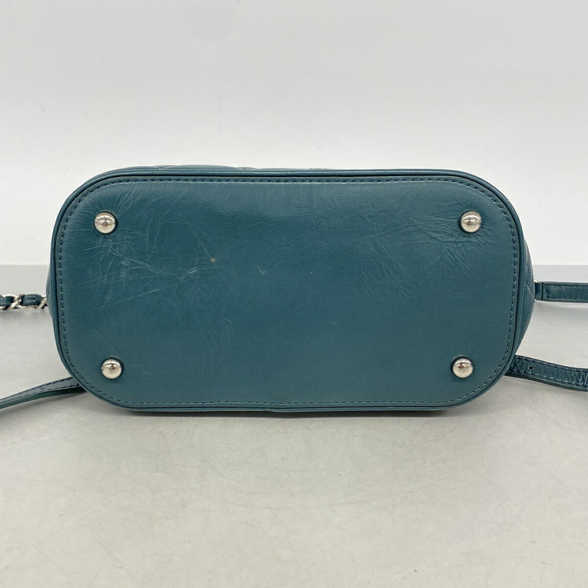 Chanel Green Leather Vinyl Backpack (Pre-Owned)