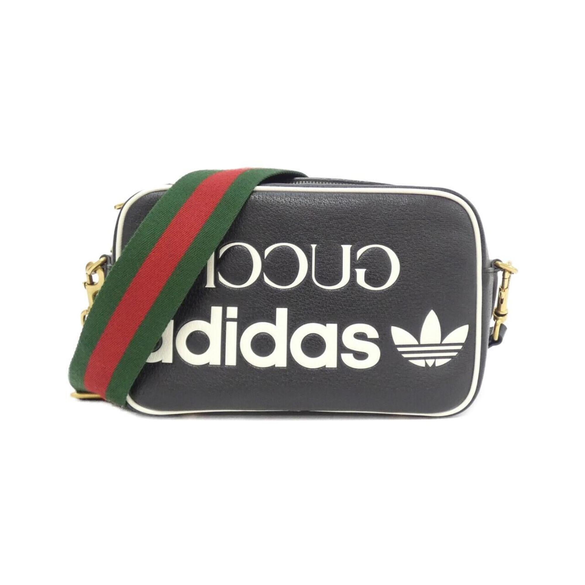 Gucci Black White Leather Shoulder Bag (Pre-Owned)