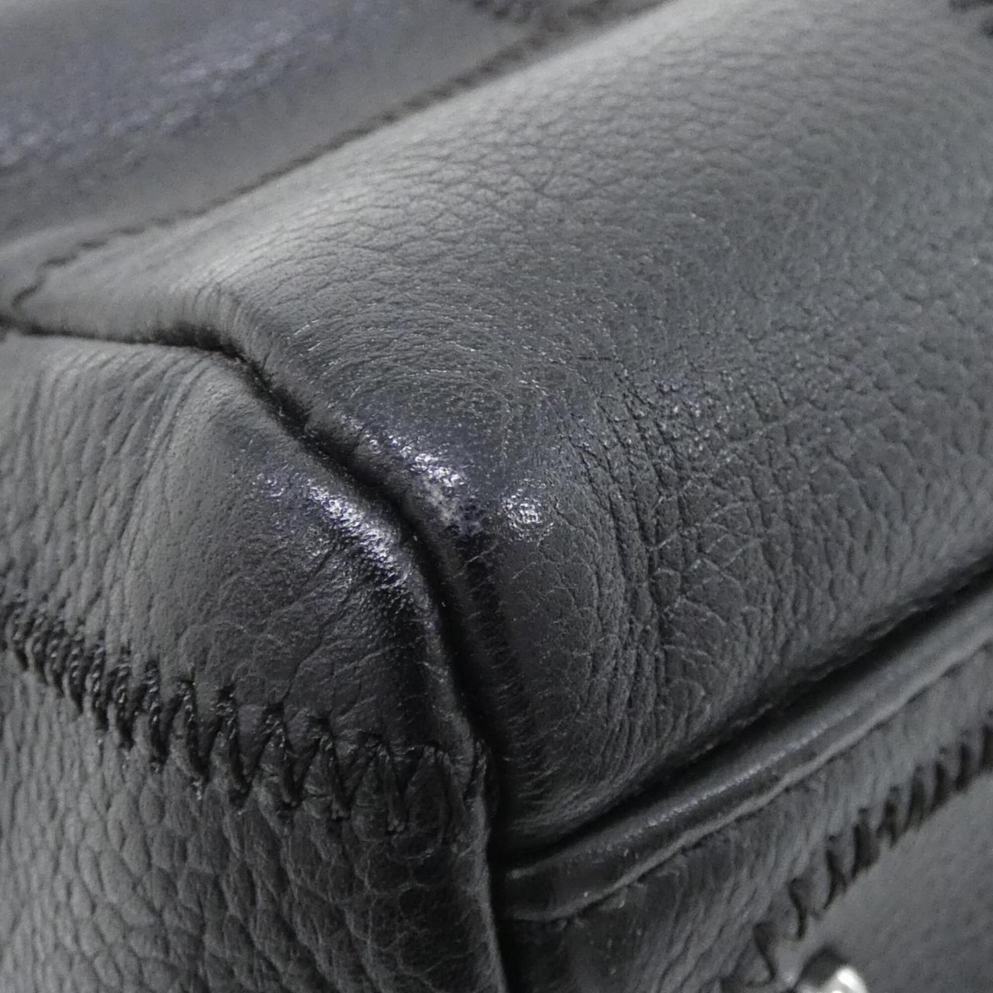 Chanel Black Grained Calfskin Handbag (Pre-Owned)