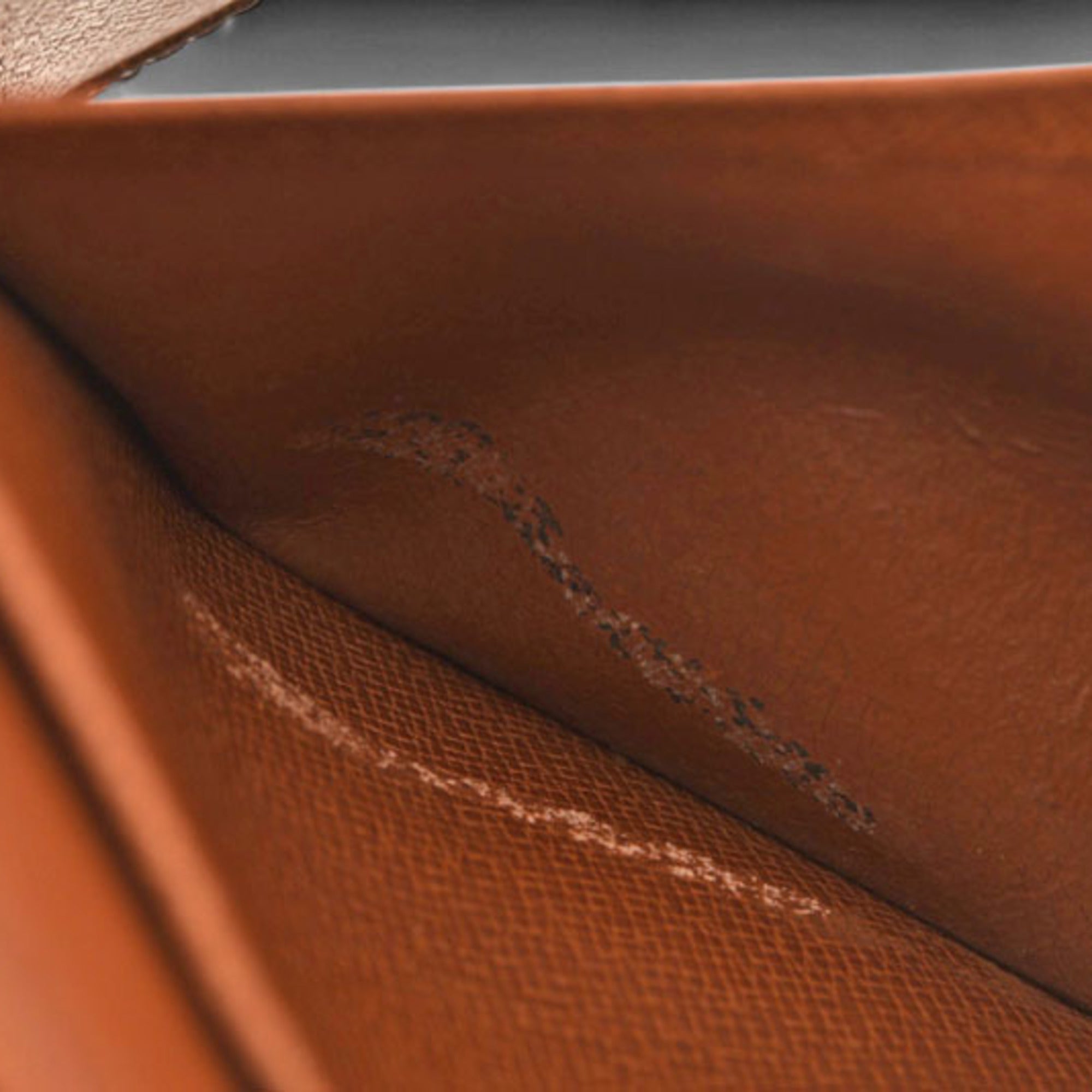 Louis Vuitton Brown Coated Canvas Wallet (Bi-Fold) (Pre-Owned)