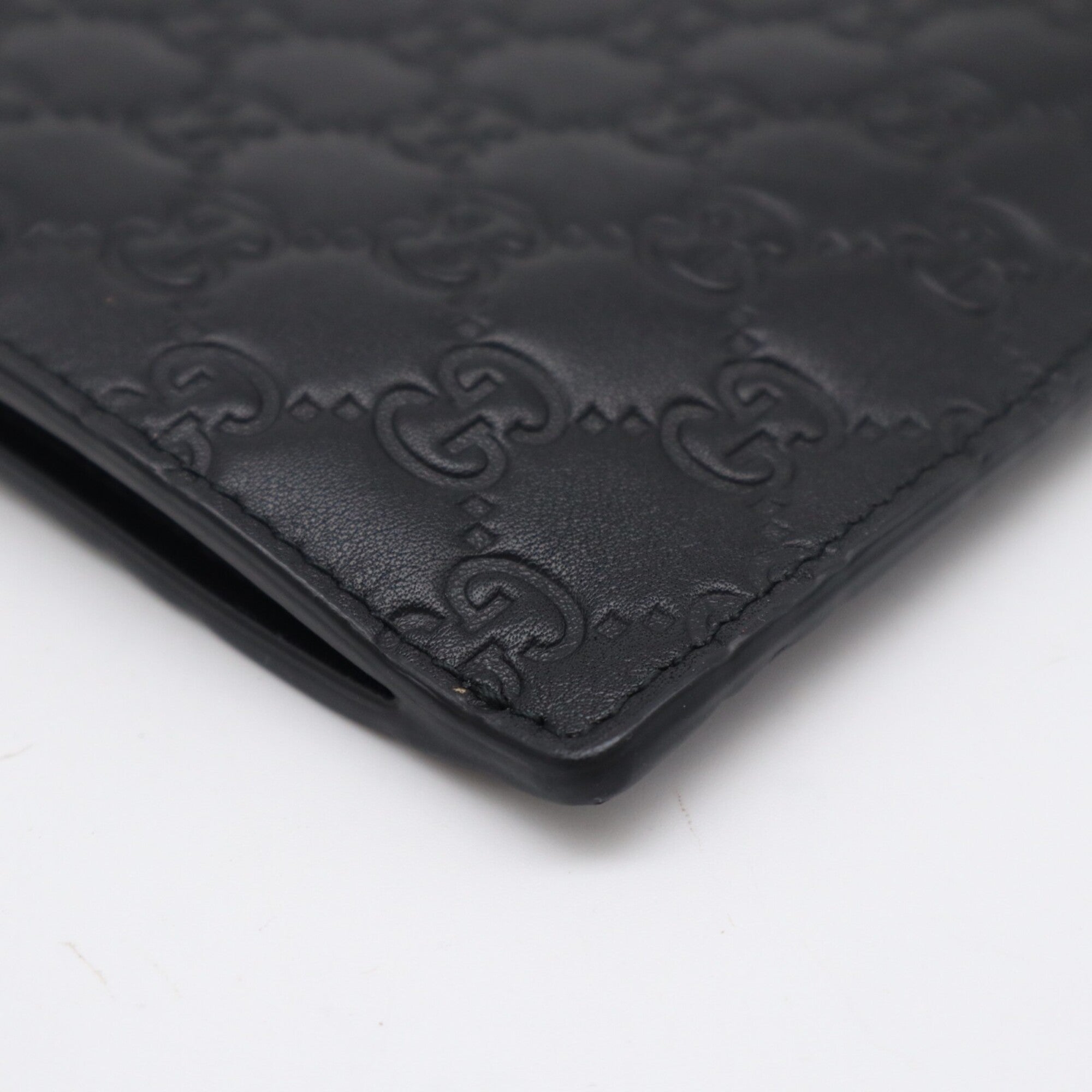 Gucci Guccissima Black Leather Clutch Bag (Pre-Owned)