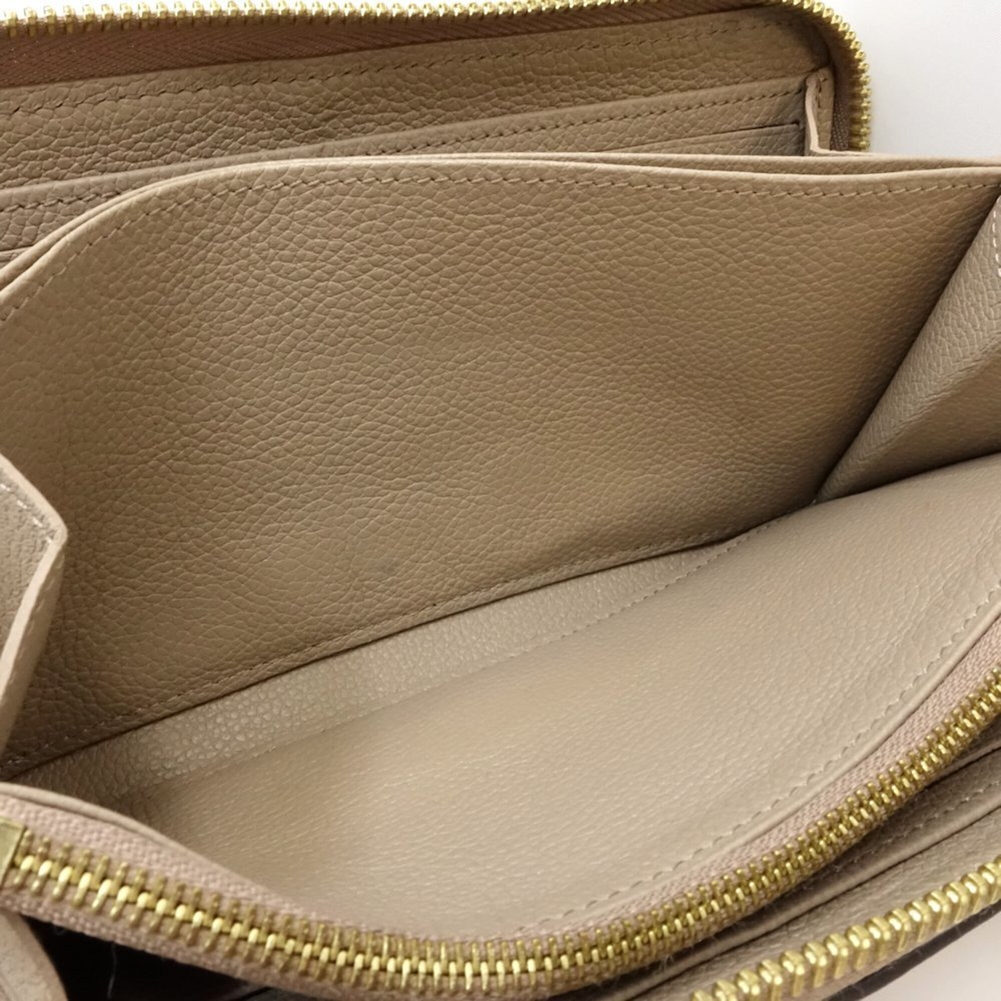 Louis Vuitton Monogram Empreinte Tourterelle Monogram Empreinte Long Wallet (Bi-Fold) (Pre-Owned)