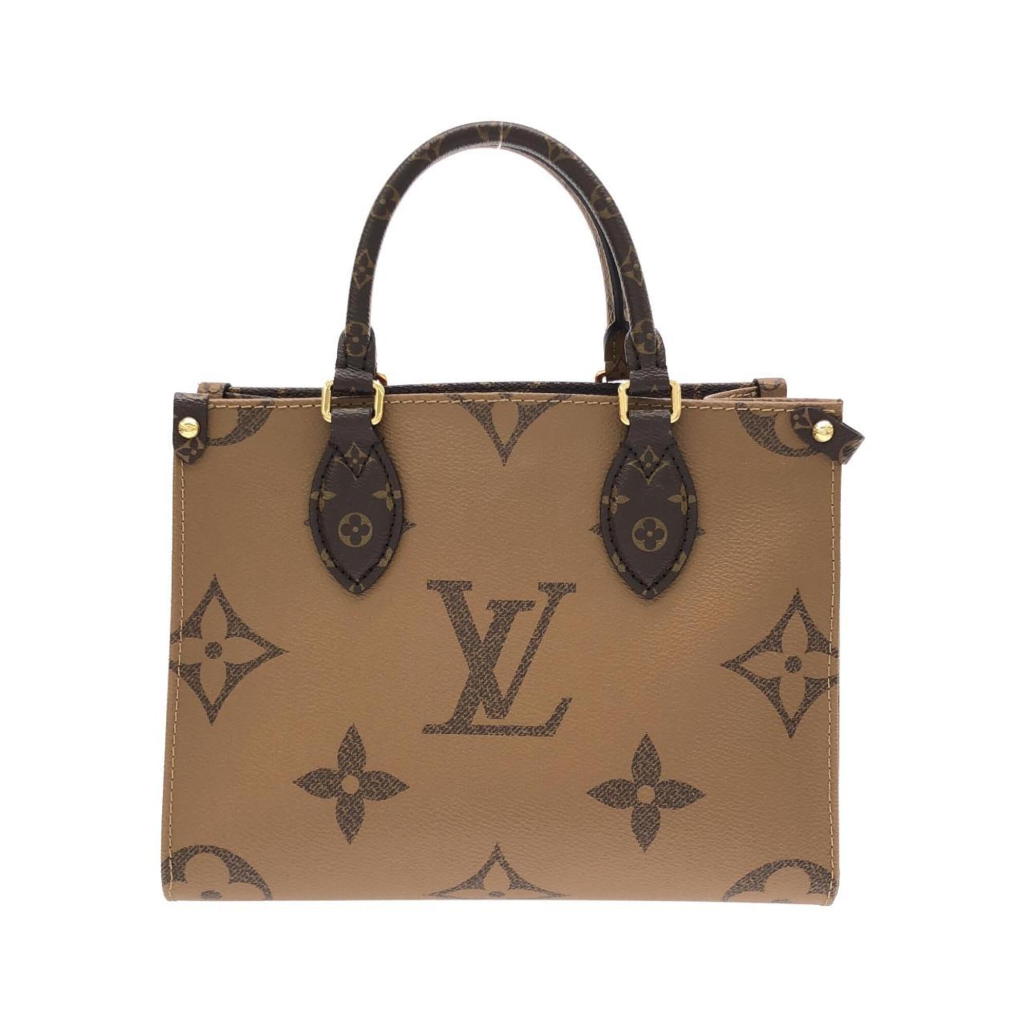 Louis Vuitton Brown Coated Canvas Handbag (Pre-Owned)