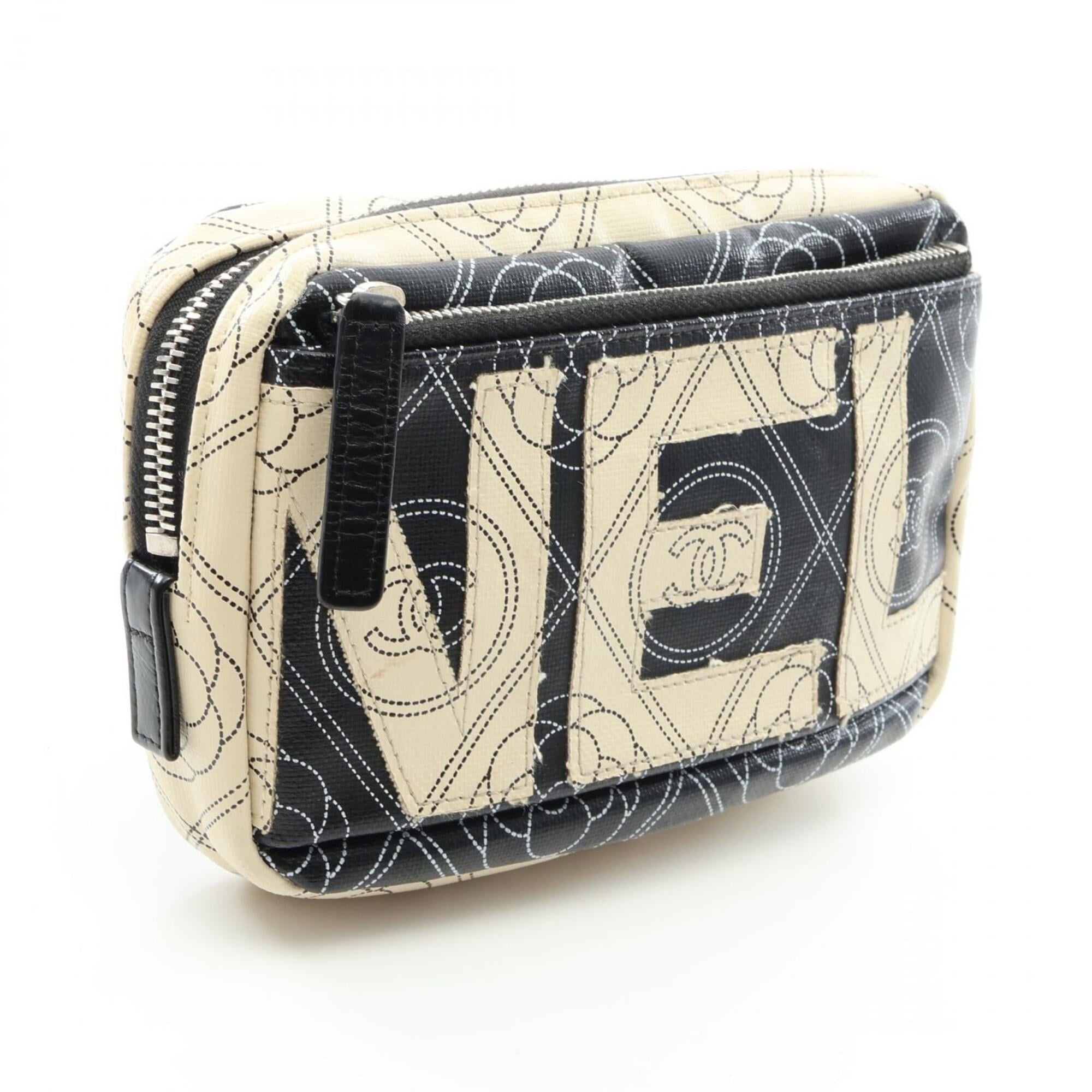 Chanel Black White Coated Canvas Pouch (Pre-Owned)