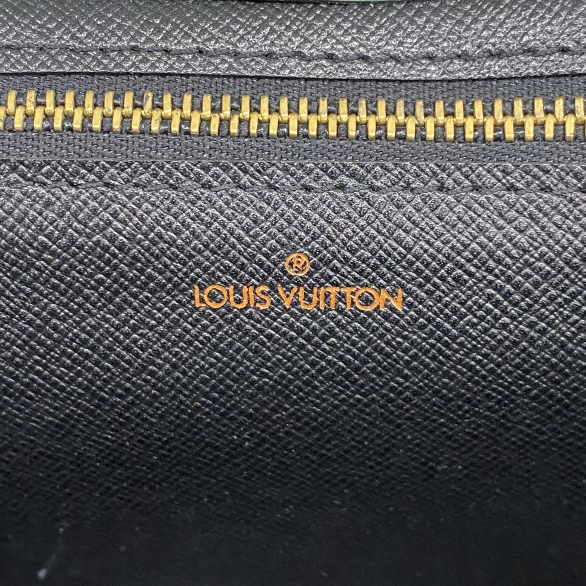 Louis Vuitton Borneo Green Clutch Bag (Pre-Owned)