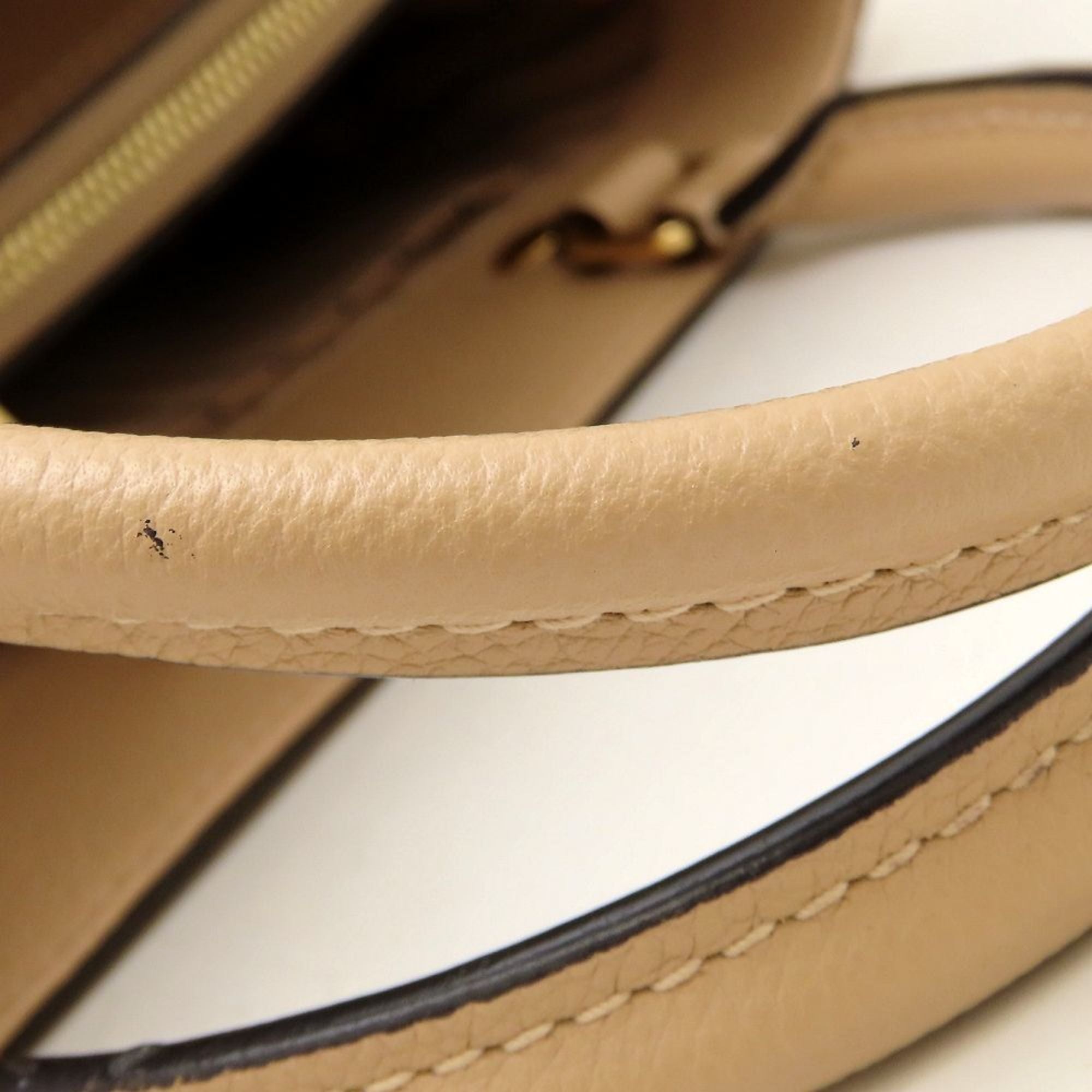 Louis Vuitton Dune Leather Handbag (Pre-Owned)